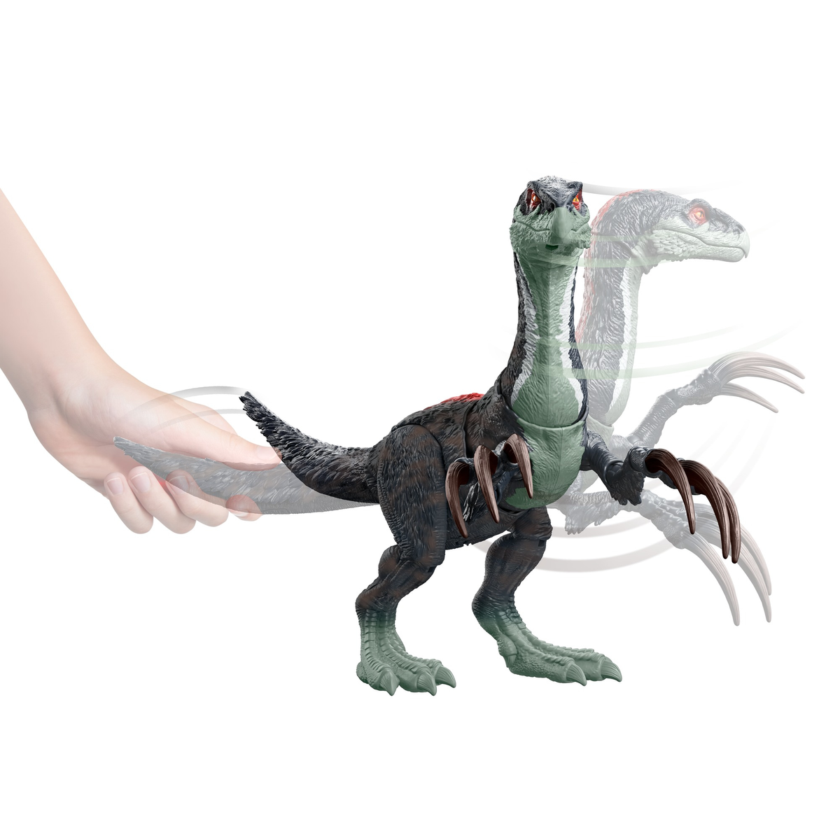 Un dinosauro giocattolo con una mano che manipola gli artigli. Il dinosauro è verde e nero.
