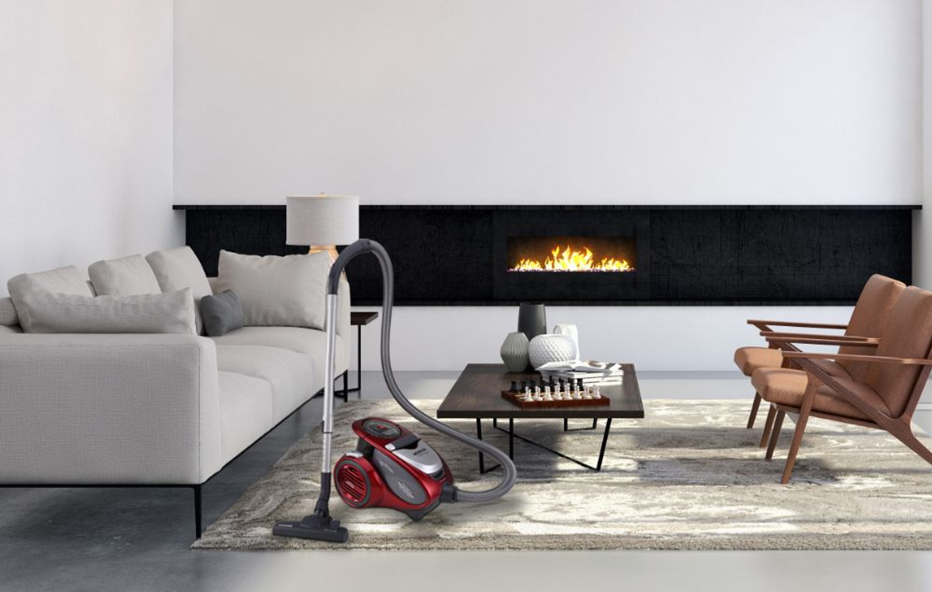 Salón con aspiradora roja, sofá, chimenea y sillas. La habitación es luminosa.