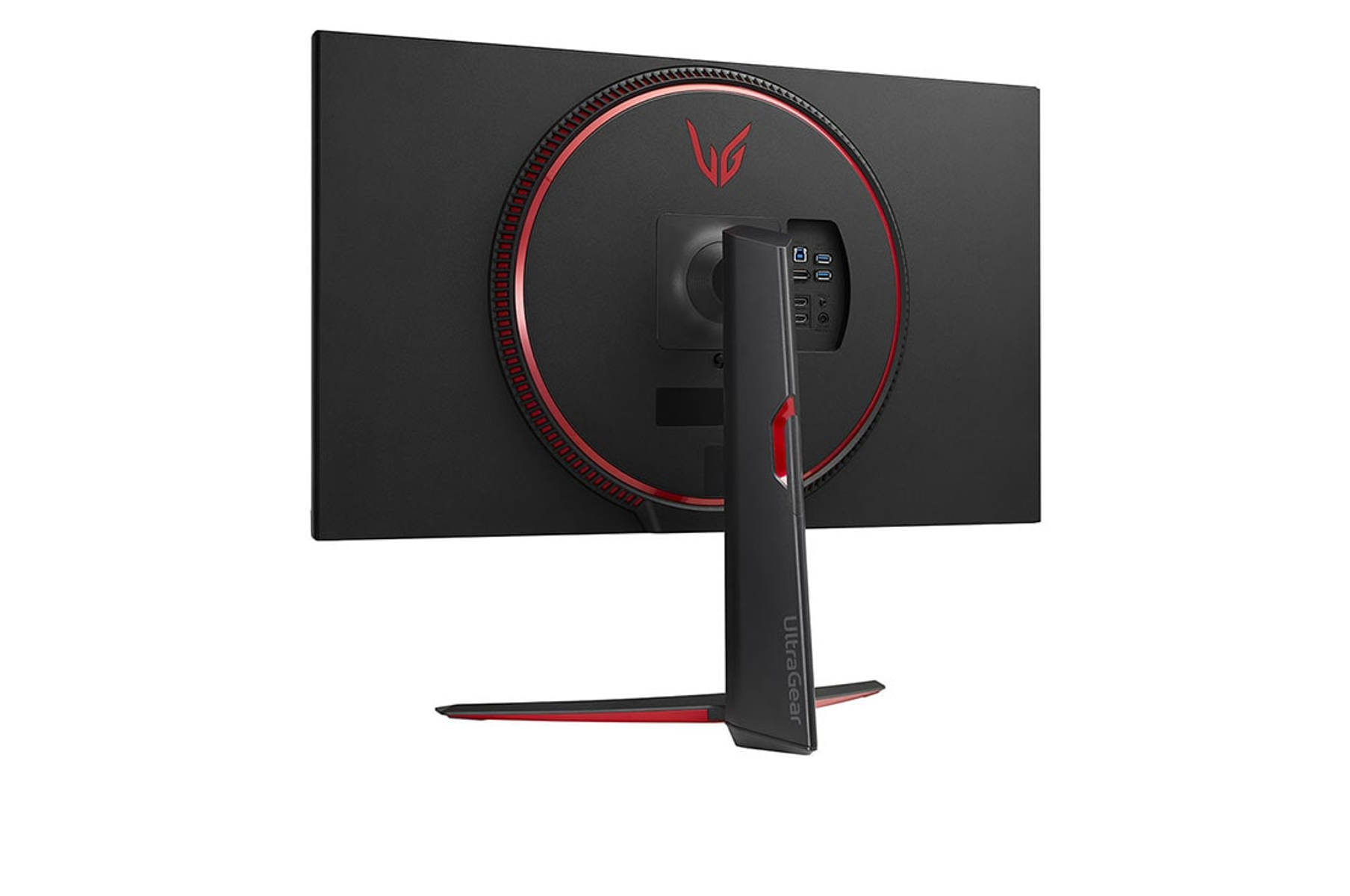 Parte trasera de un monitor negro con acento circular rojo y soporte. Logo LG visible.