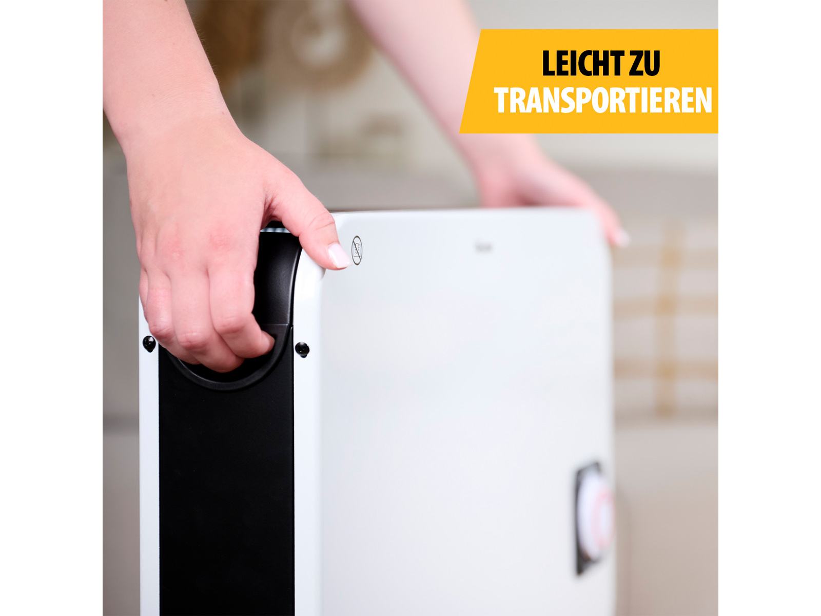 Osoba trzyma białe urządzenie z czarnym uchwytem, z tekstem 'leicht zu transportieren'.