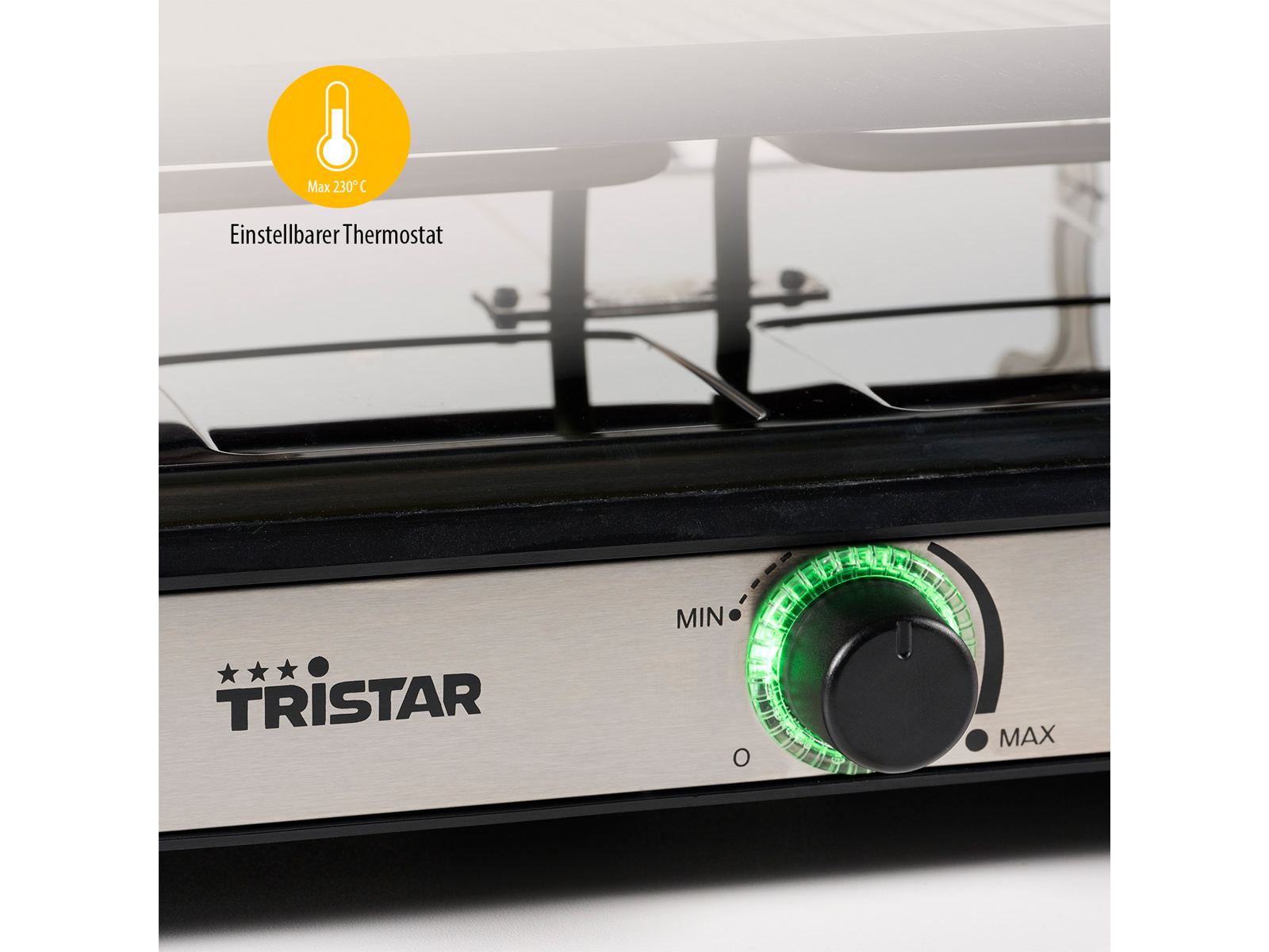 Un primo piano di una griglia con una manopola di controllo della temperatura, che mostra il logo Tristar.