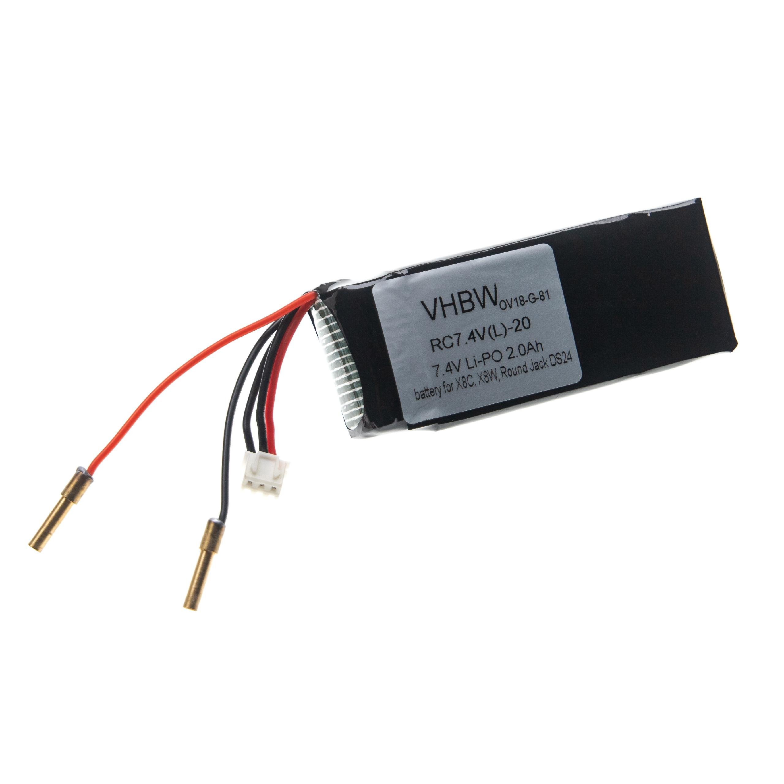 Eine weiße Batterie mit schwarzen und roten Drähten und einem Stecker.