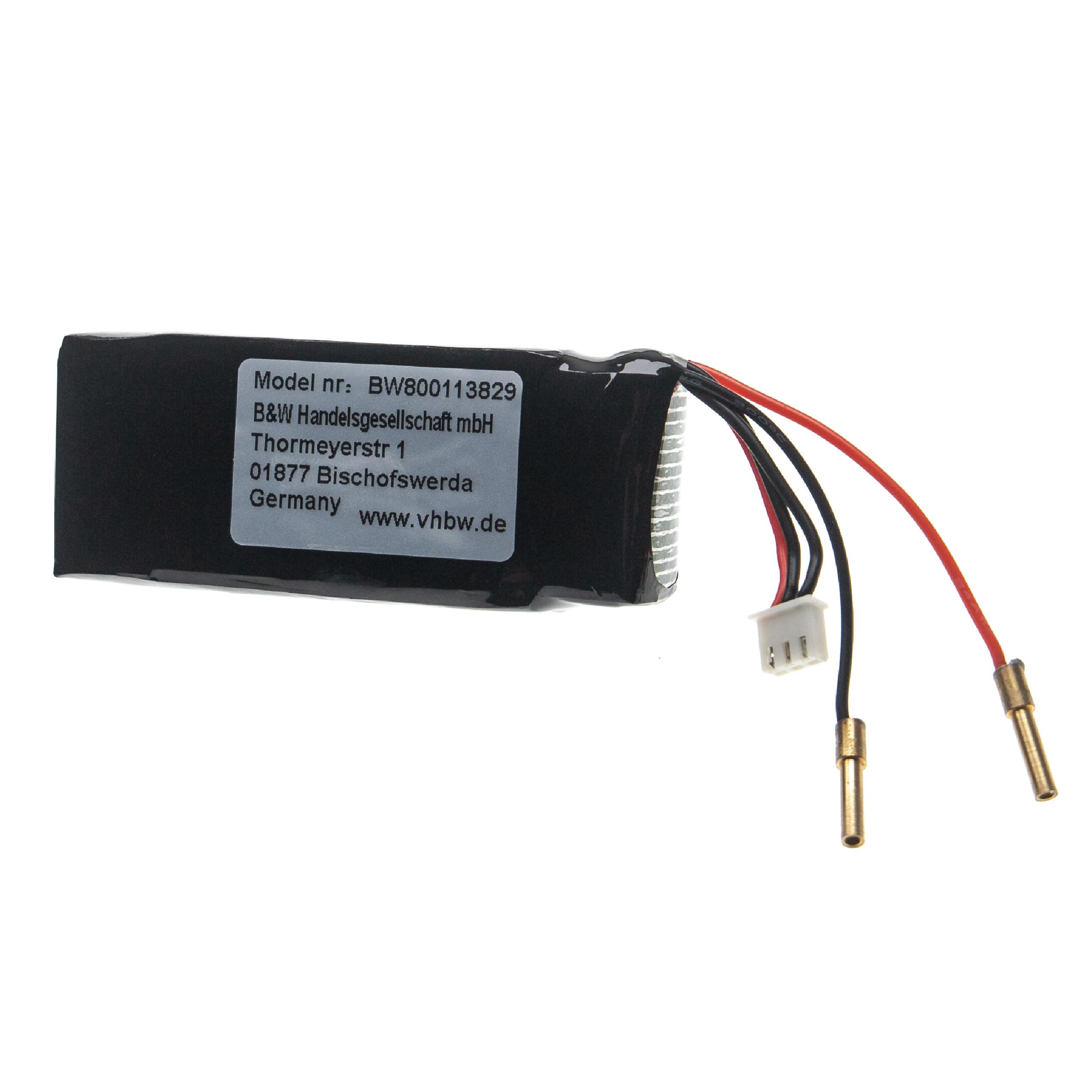 Eine kleine schwarze Batterie mit Drähten und Anschlüssen. Sie hat ein Etikett mit Text und Informationen.