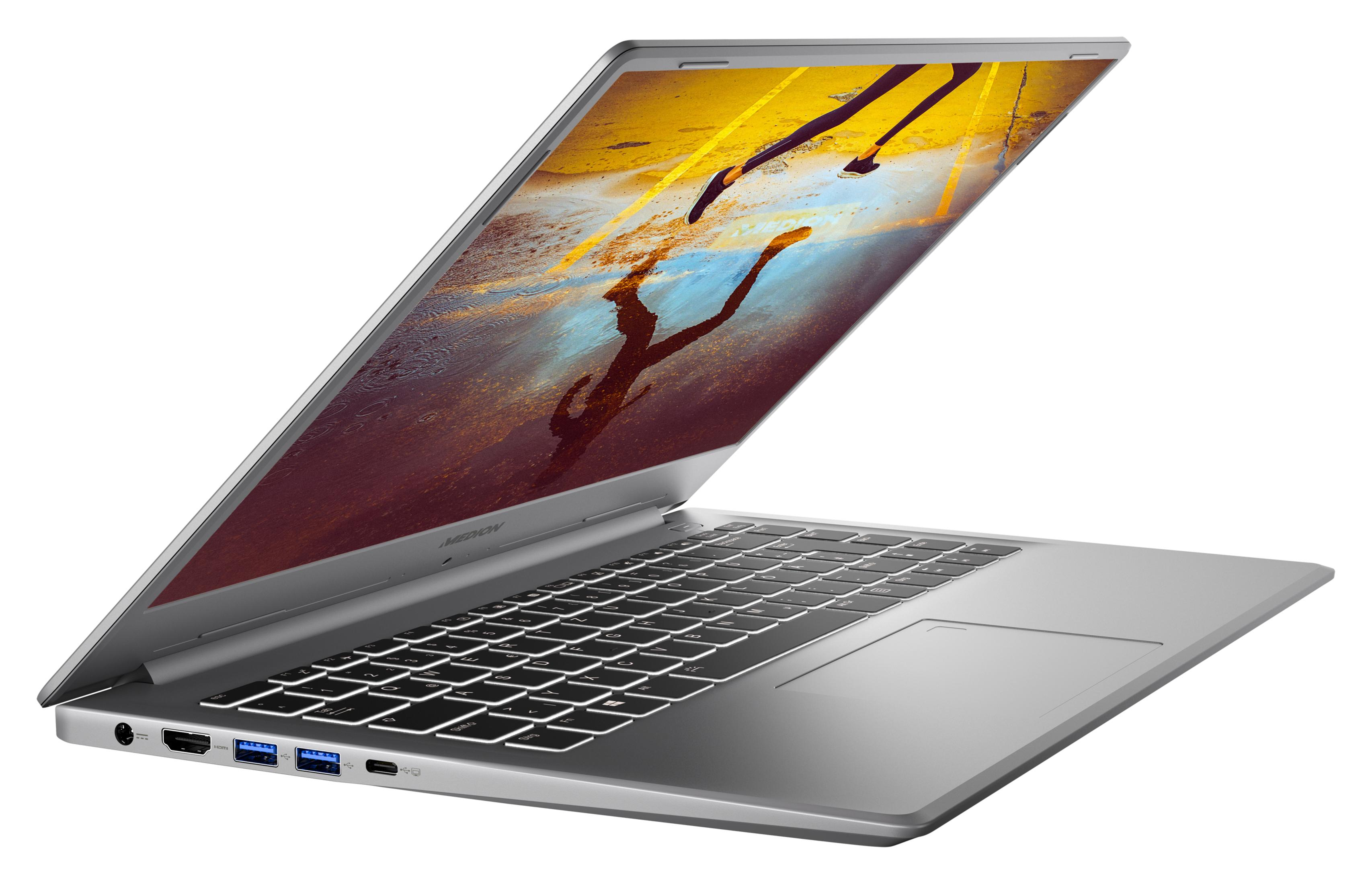 Silberner Laptop mit offenem Bildschirm. Tastatur und Touchpad sichtbar. Der Bildschirm zeigt ein Design.