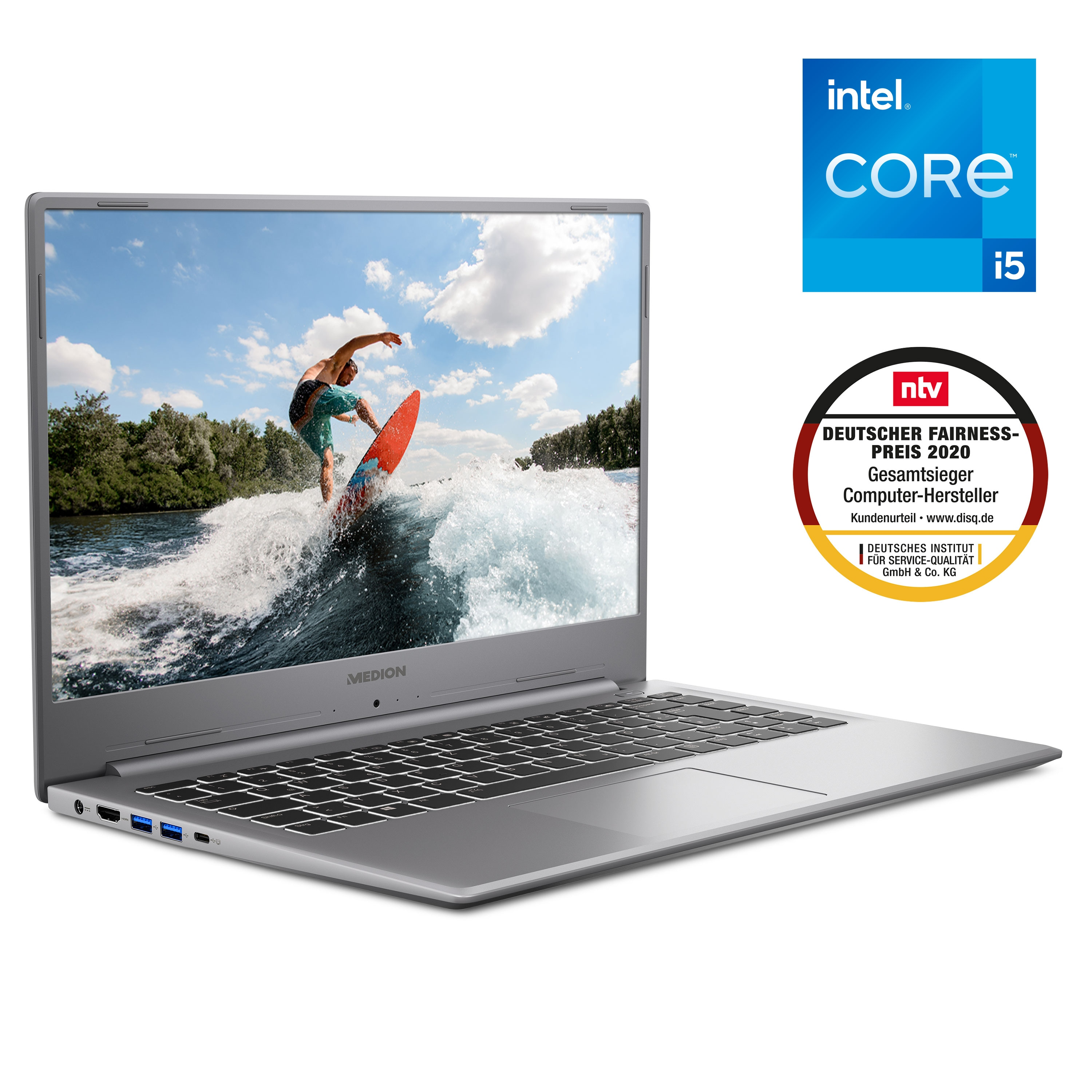 Ein silberner Laptop mit dem Intel Core i5 Logo und einem deutschen Fairness-Auszeichnungsaufkleber.