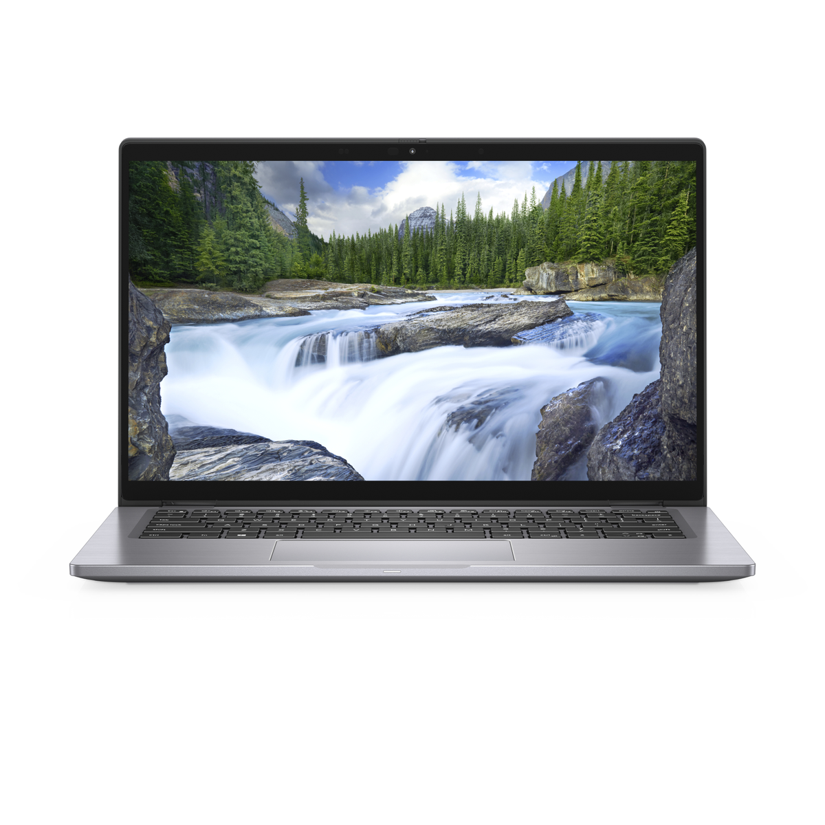 A silver laptop open, displaying a waterfall scene. The background is a white surface. Keyboard in view.