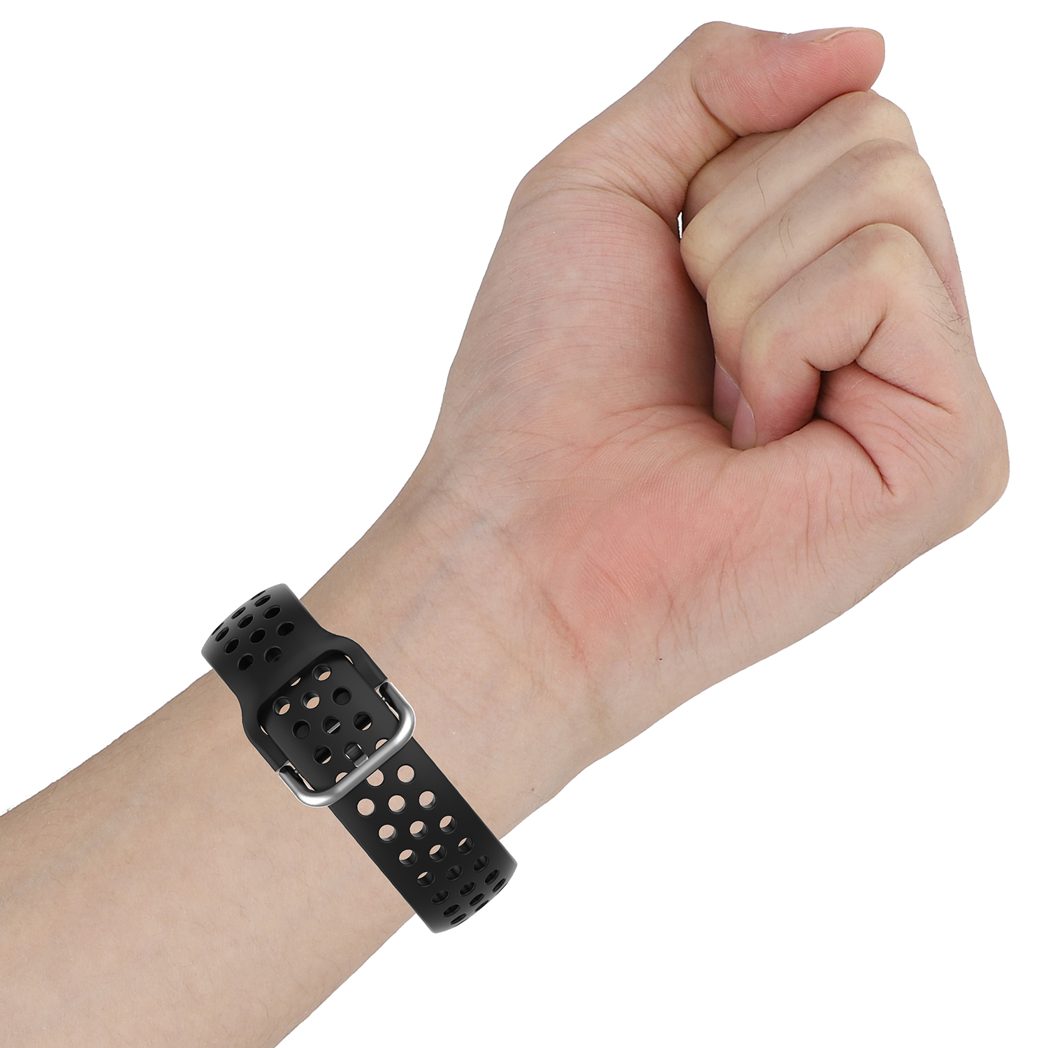 Eine Hand, die eine schwarze Uhr mit Löchern trägt.