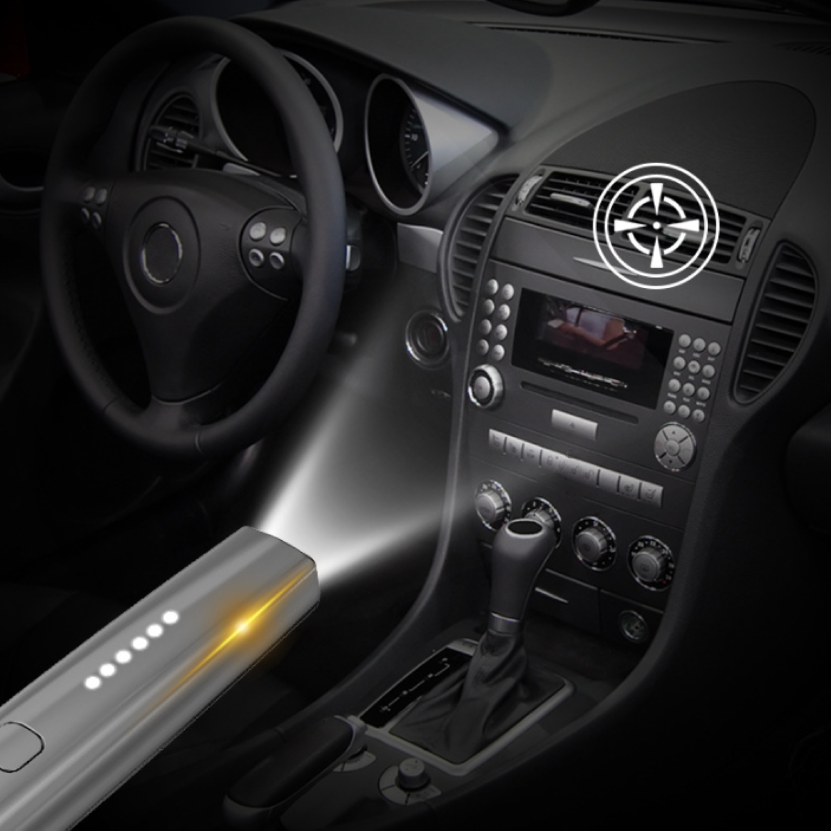 Autointerieur mit Licht von einem Handgerät auf das Armaturenbrett gerichtet.