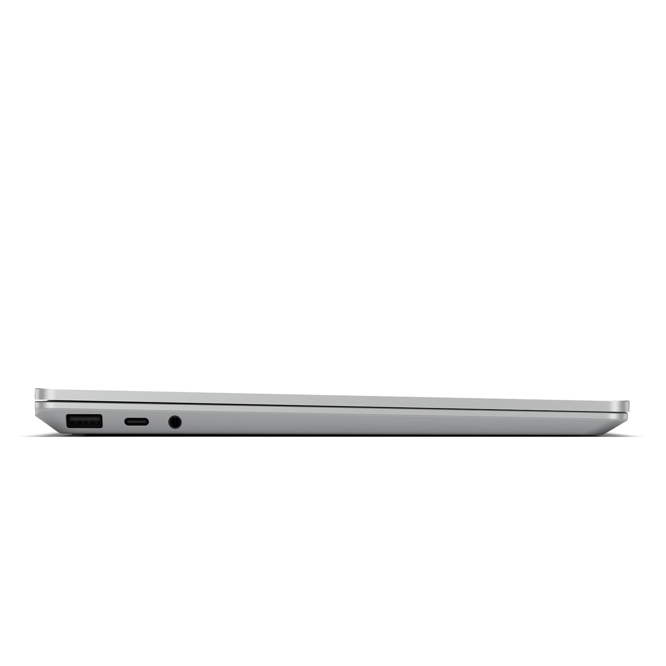 Seitenansicht eines silbernen Laptops, zeigt den Anschluss und das Design.
