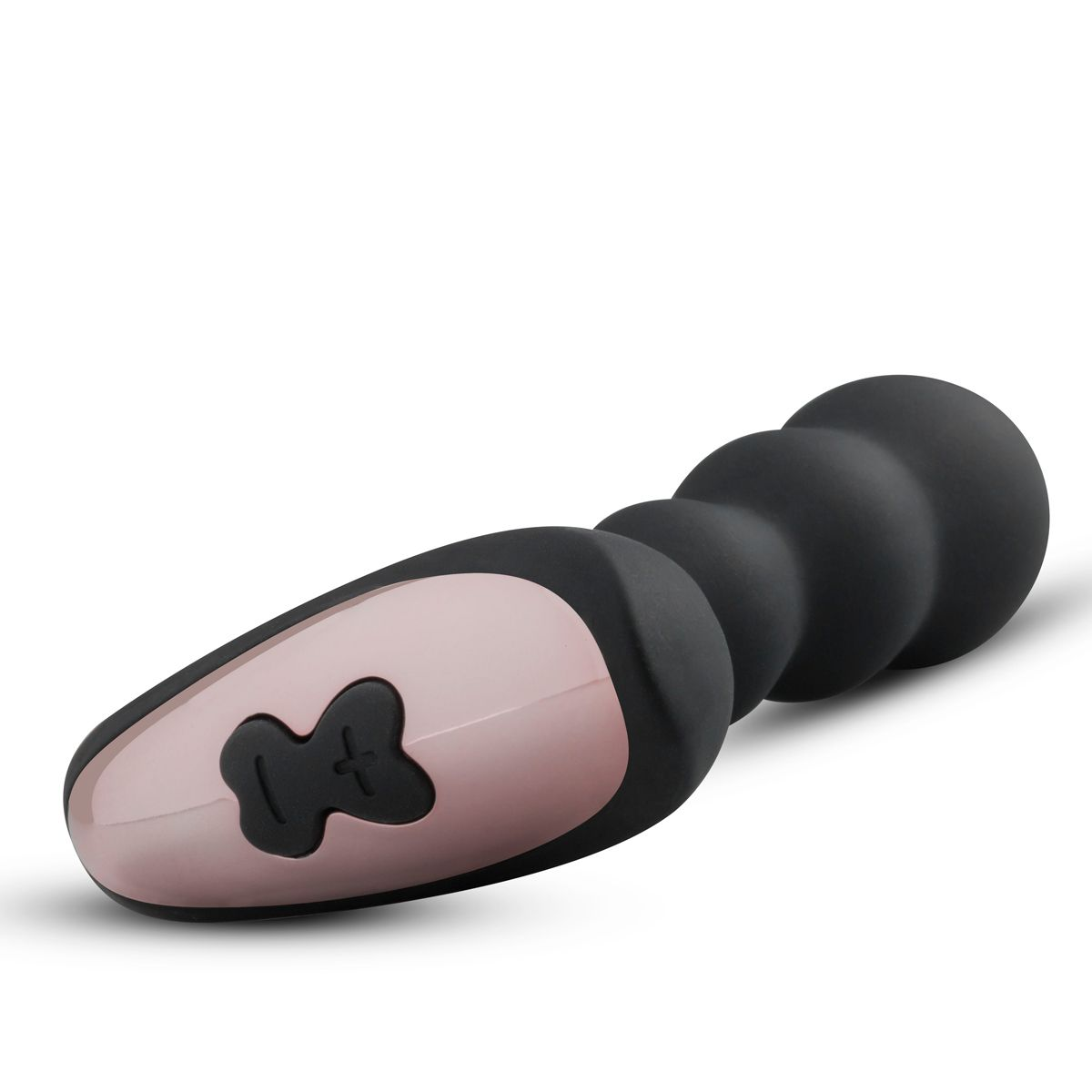 Ein schwarzes und pinkfarbenes Sexspielzeug liegt auf einer weißen Oberfläche. Es hat einen abgerundeten Kopf mit Bedienfeld und einen strukturierten Körper.