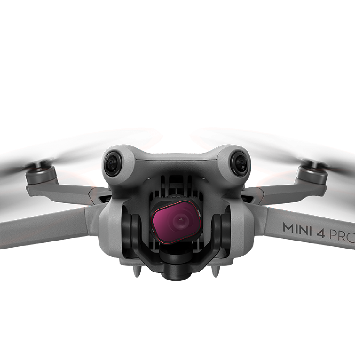 Een grijze drone met rode propellers en camera. Zwarte achtergrond.