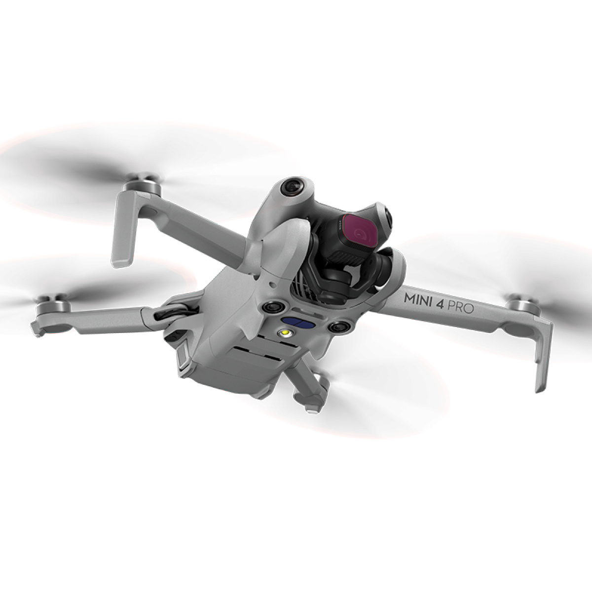 Een grijze drone met rode propellers tegen een zwarte achtergrond.