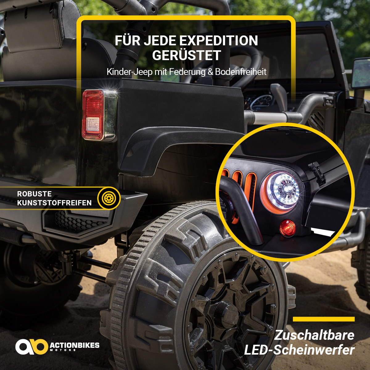 Schwarzer Spielzeug-Jeep. Nahaufnahme von Rad, LED-Scheinwerfern und Text auf Deutsch.