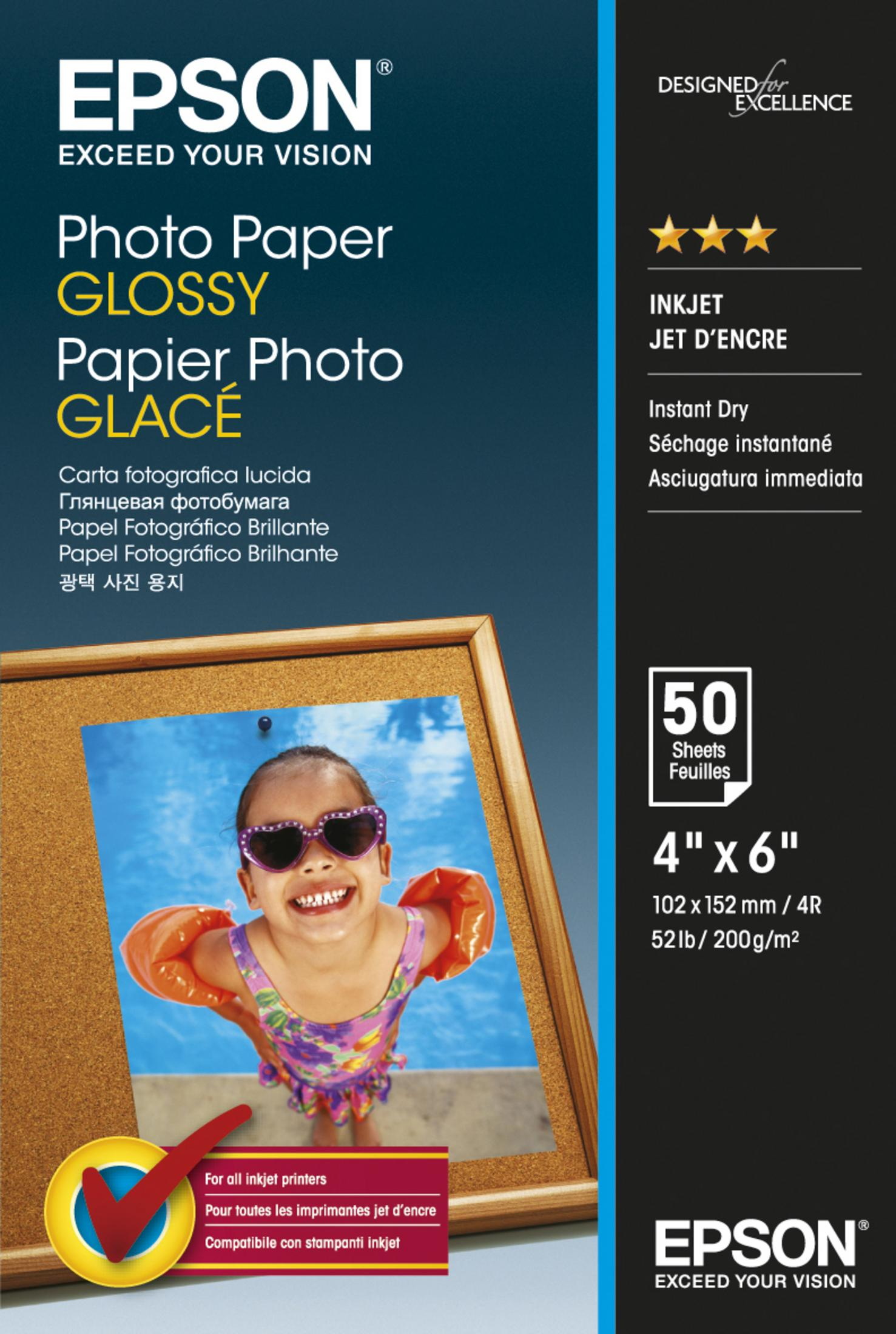 Epson Fotopapier-Verpackung mit Kinderfoto auf Kork. Blau-weiße Verpackung.