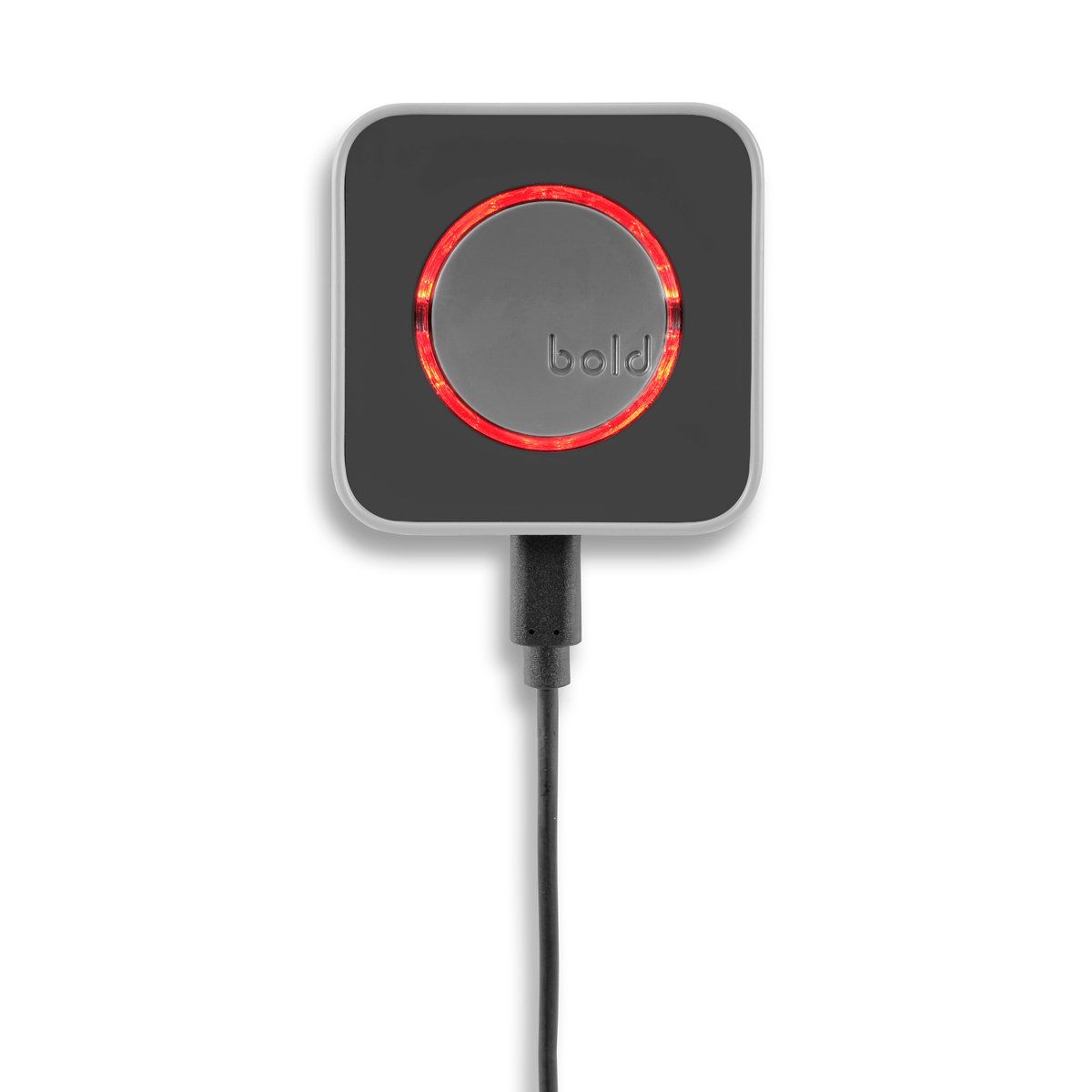 Un dispositivo cuadrado negro y gris con un círculo rojo brillante. Un cable de alimentación negro está conectado. Fondo blanco.