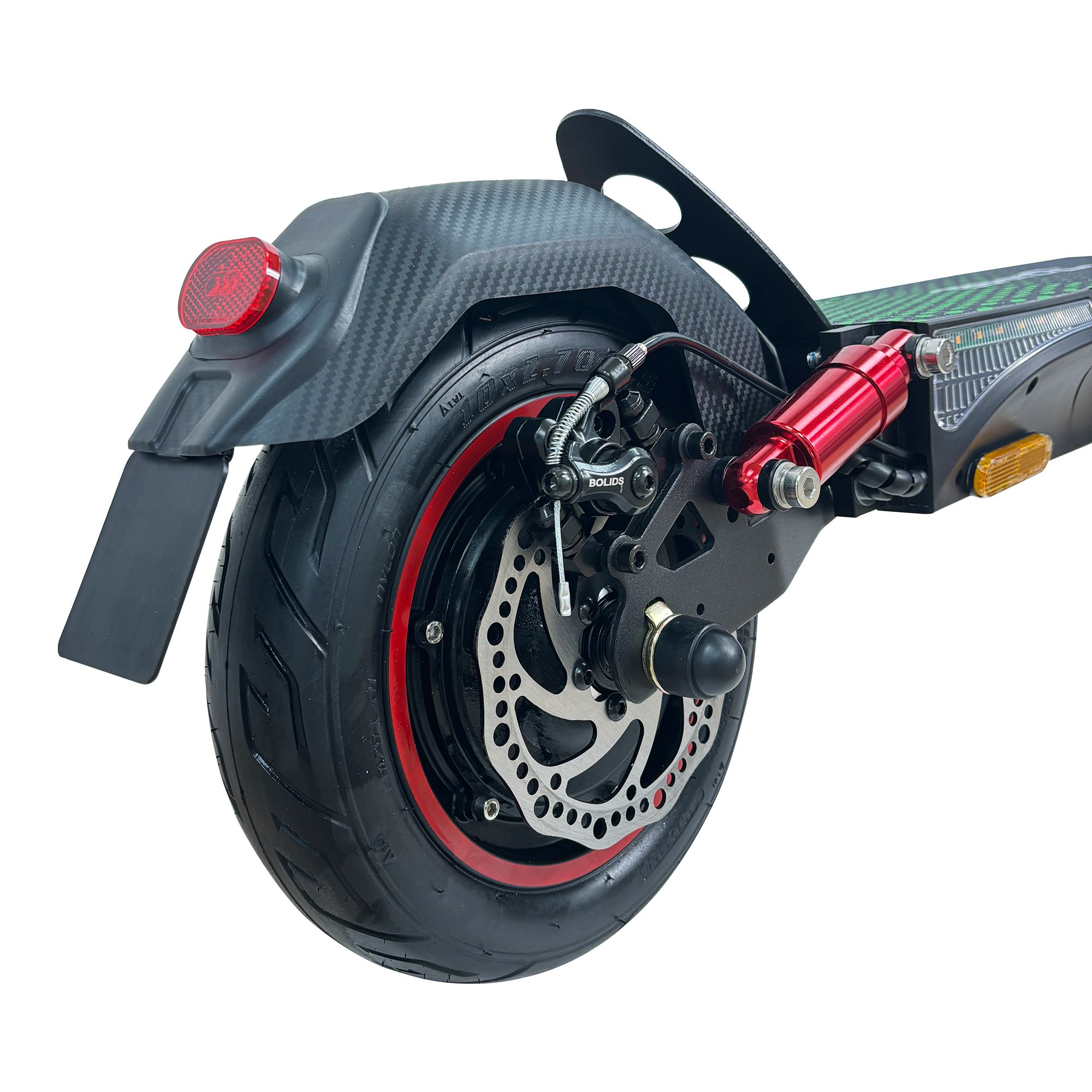 Primer plano del conjunto de la rueda trasera de un scooter, incluidos los componentes del freno y la suspensión.