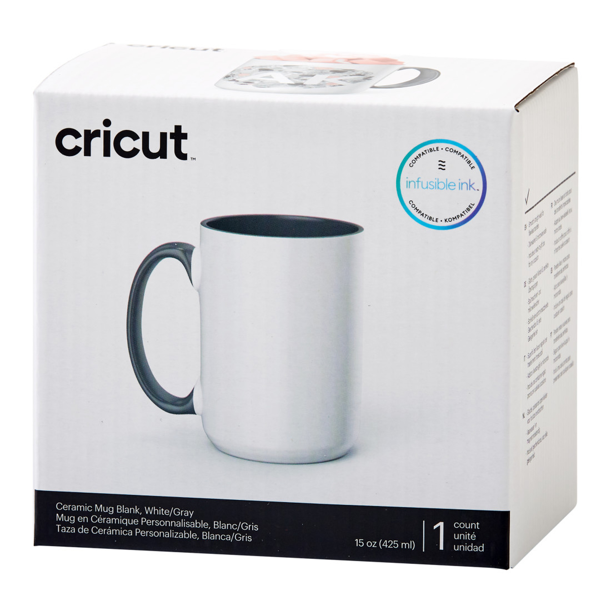 Weiße Tasse mit grauem Henkel und grauem Innenraum, in einer weißen Box mit 'cricut' und anderem Text darauf.