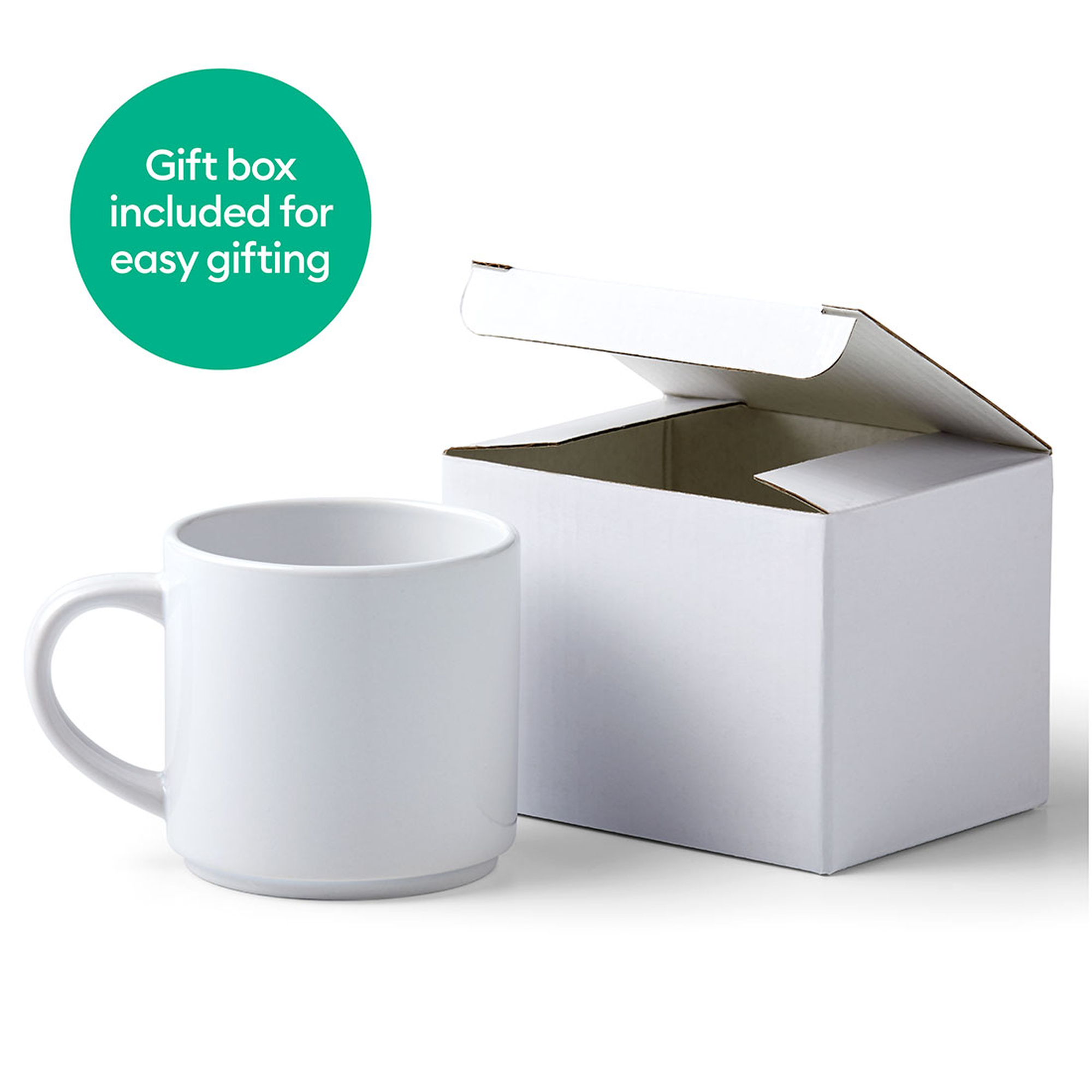 Weißer Becher mit Geschenkbox. Die Box ist weiß mit grünem Etikett. Es steht Geschenkbox enthalten.