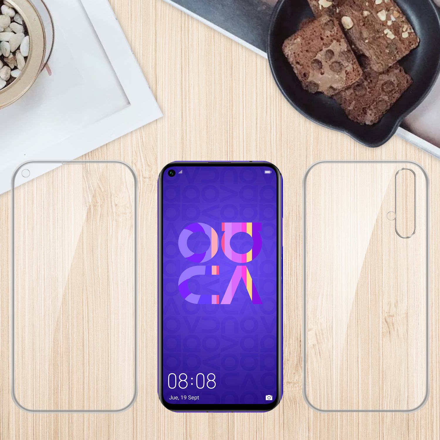 Ein Telefon mit einer transparenten Hülle und zwei transparenten Displayschutzfolien sowie etwas Essen auf dem Tisch.