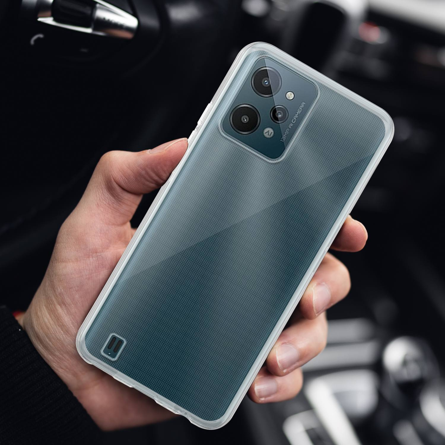 Mano che tiene un telefono con custodia trasparente. Testo: Fotocamera da 12MP.