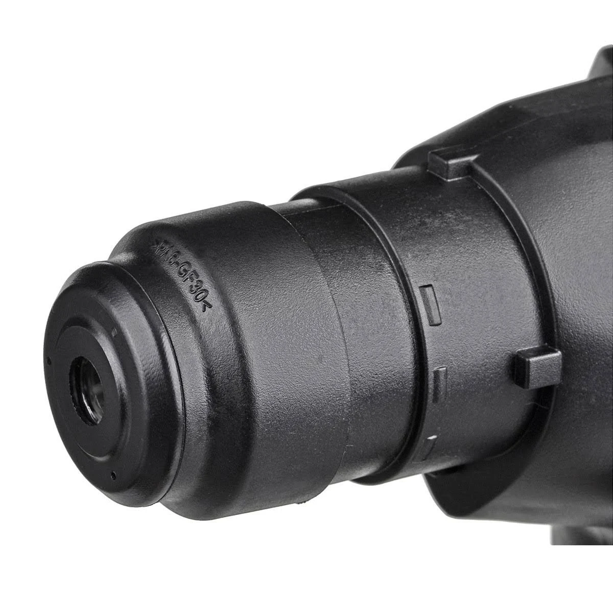 Zbliżenie czarnego wiertła z otworem.