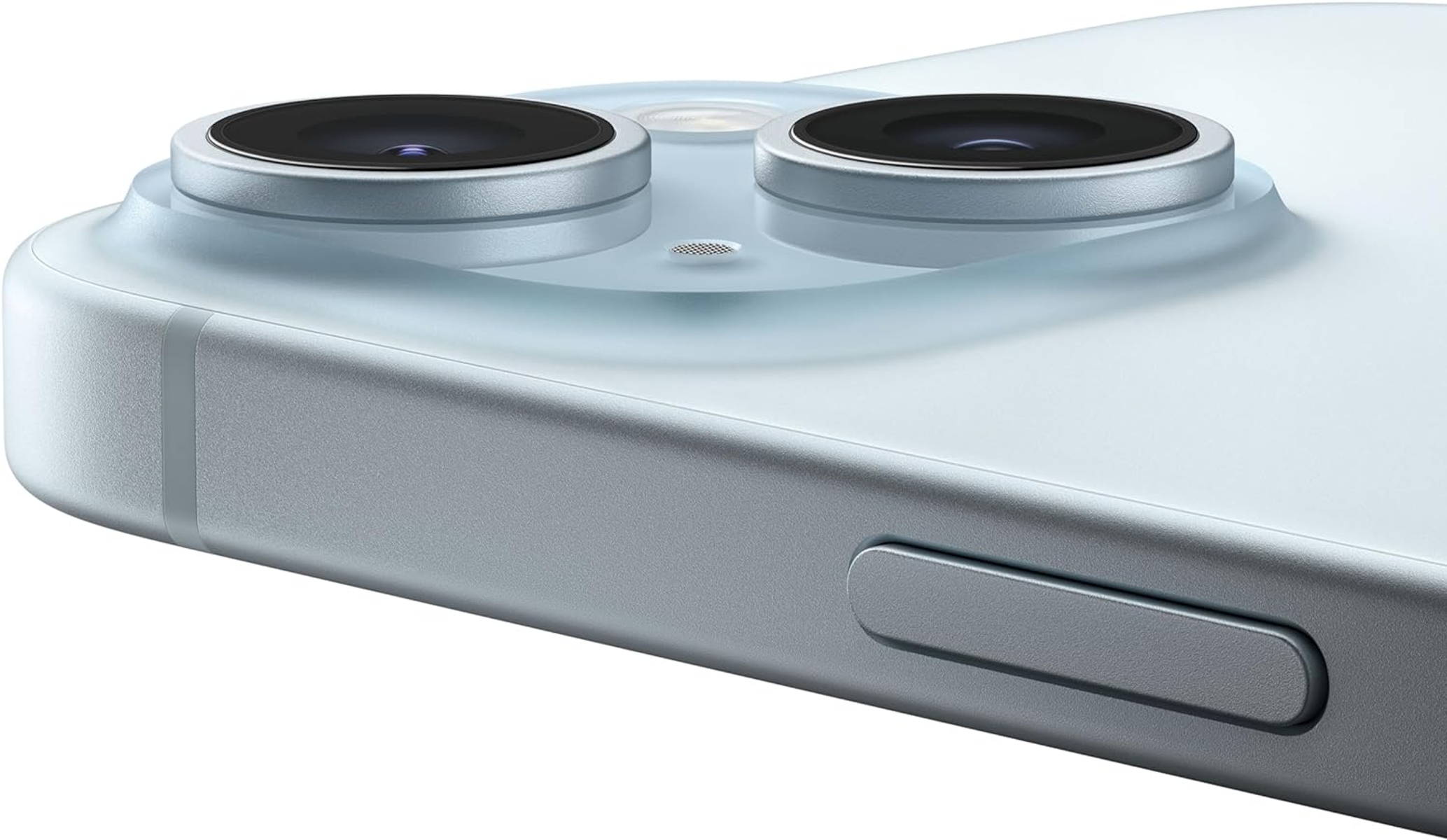 Zbliżenie rogu telefonu pokazuje obiektywy aparatu i boczny przycisk.