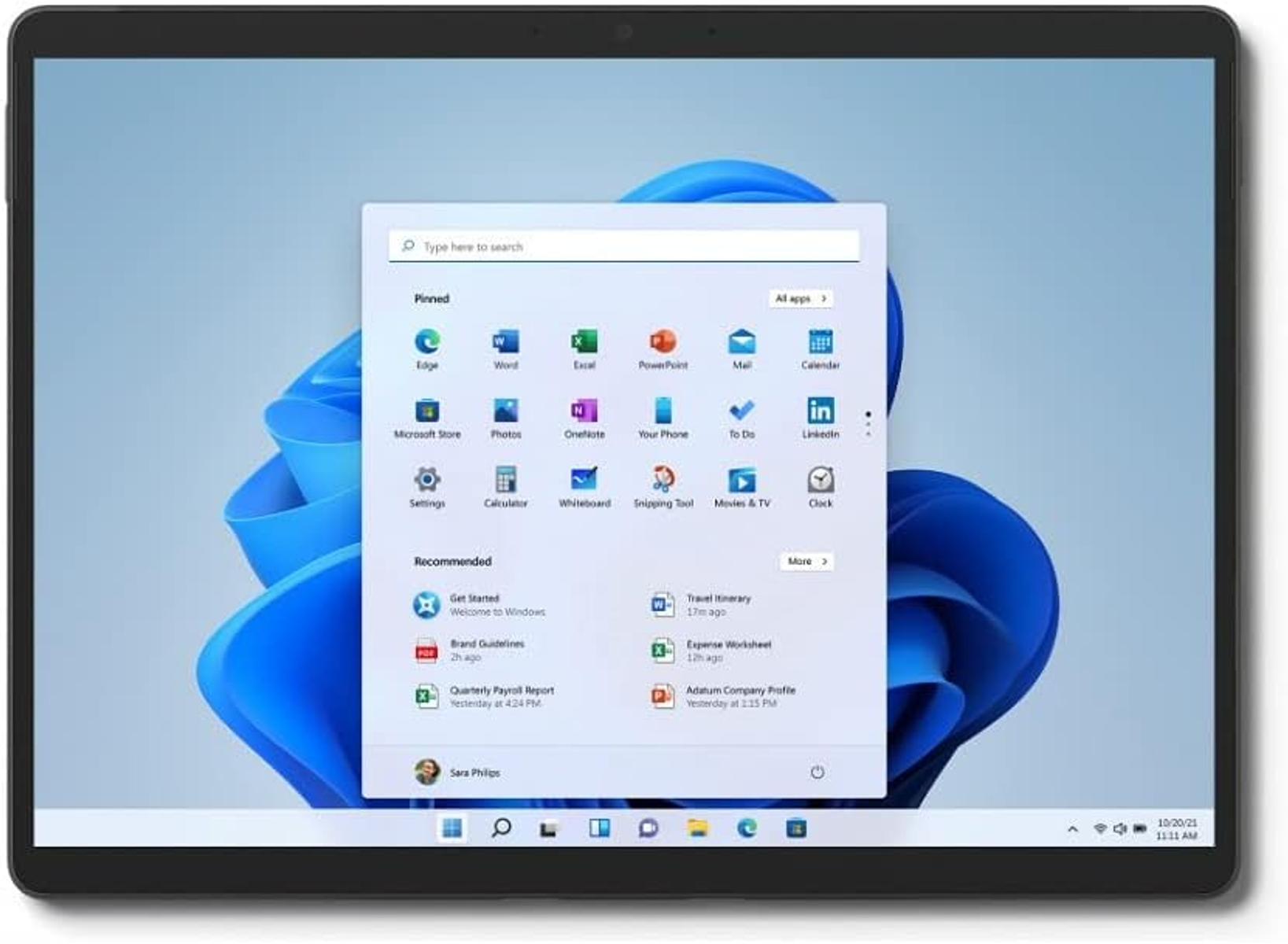 Ein schwarzes Tablet mit der Windows 11-Oberfläche mit Anwendungssymbolen auf weißem Hintergrund.