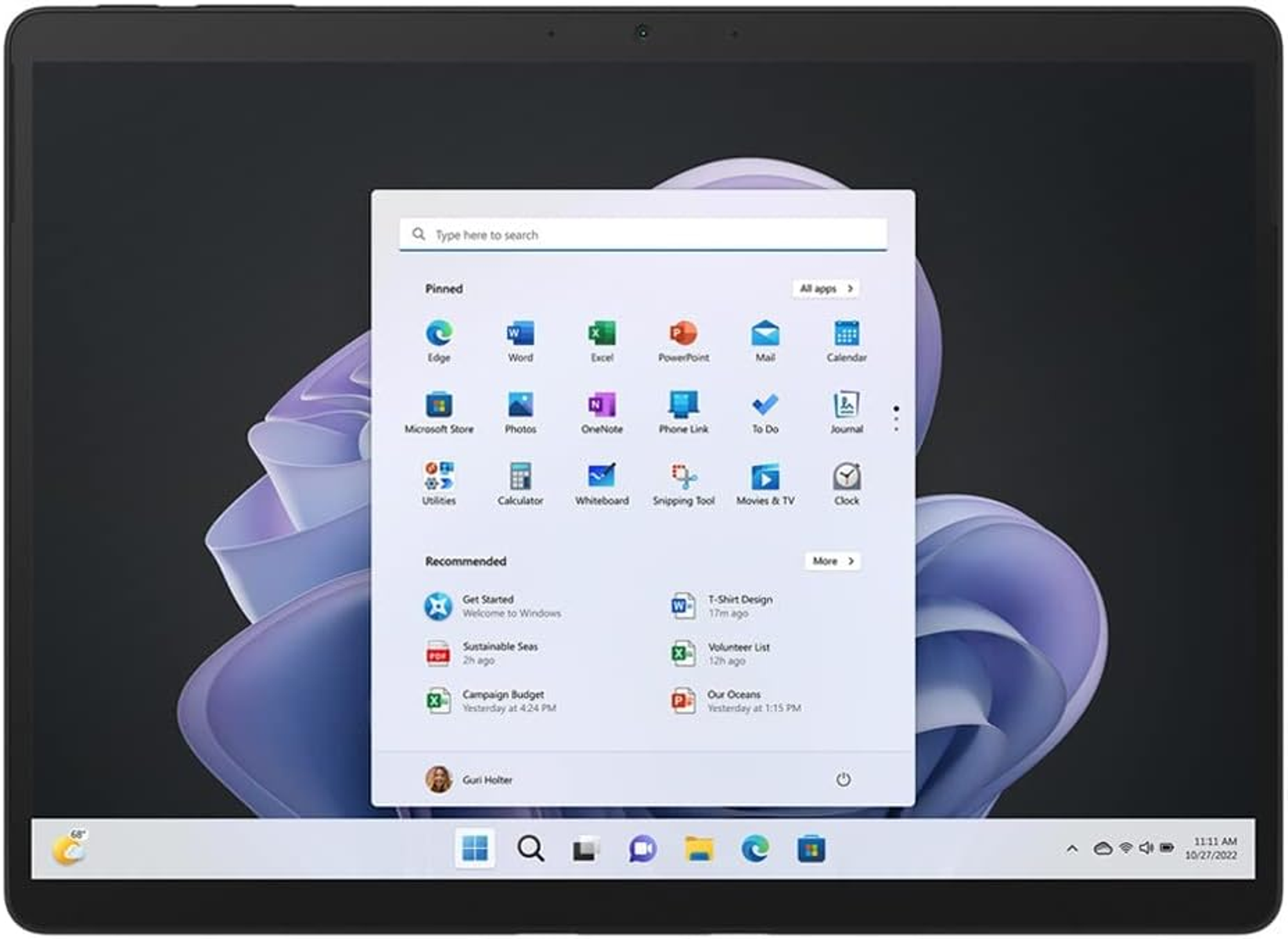 Tablet con interfaccia Windows, che mostra icone delle app e barra di ricerca, su sfondo viola.