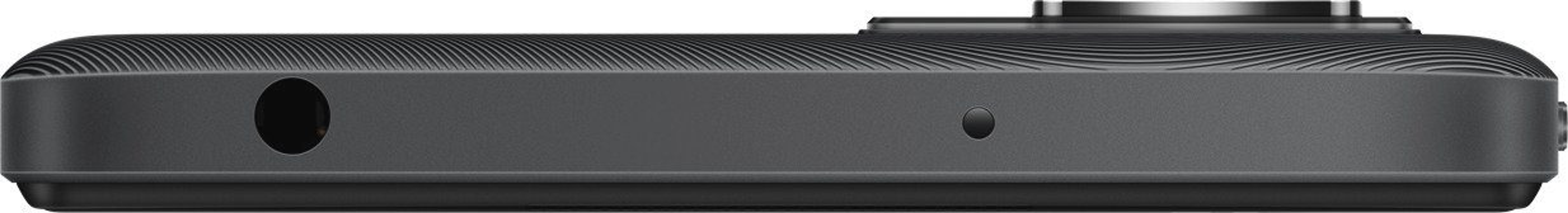 Zbliżenie na dolną część czarnego telefonu. Znajduje się gniazdo słuchawkowe, port ładowania i mikrofon.