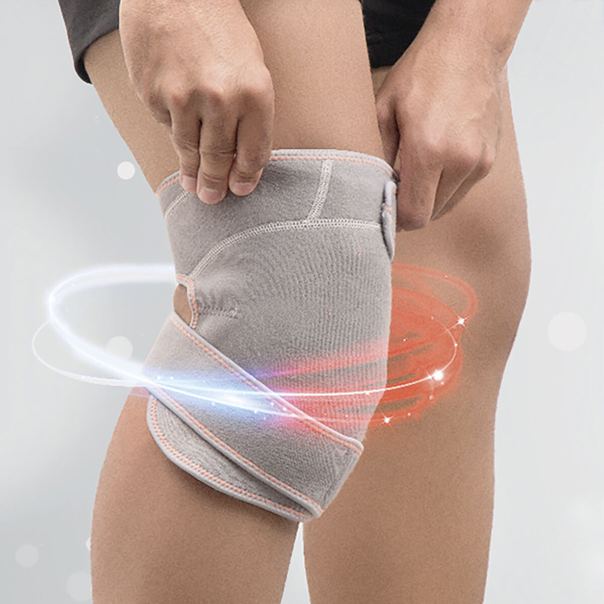 Una persona con una rodillera. La rodillera cubre su rodilla, con líneas de energía rojas visualizadas.