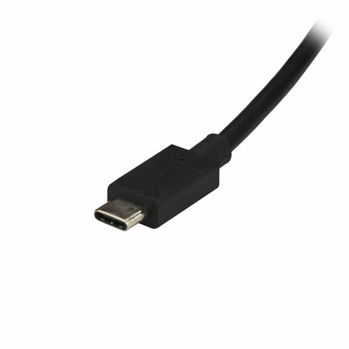 Cable USB-C negro sobre fondo blanco. El conector está centrado y el cable se extiende en diagonal.