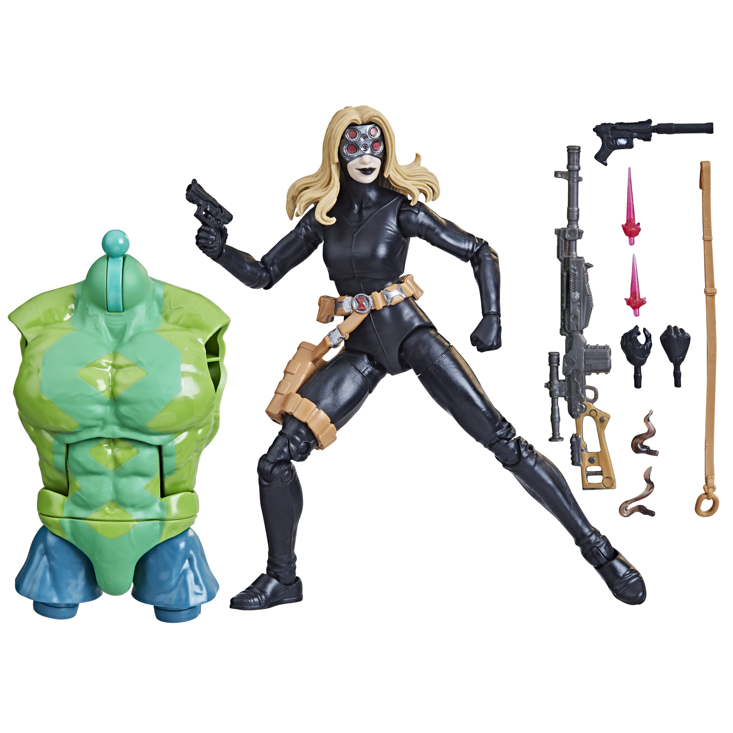 Figura de acción con accesorios, incluyendo una pistola, un rifle y parte de una figura verde grande.