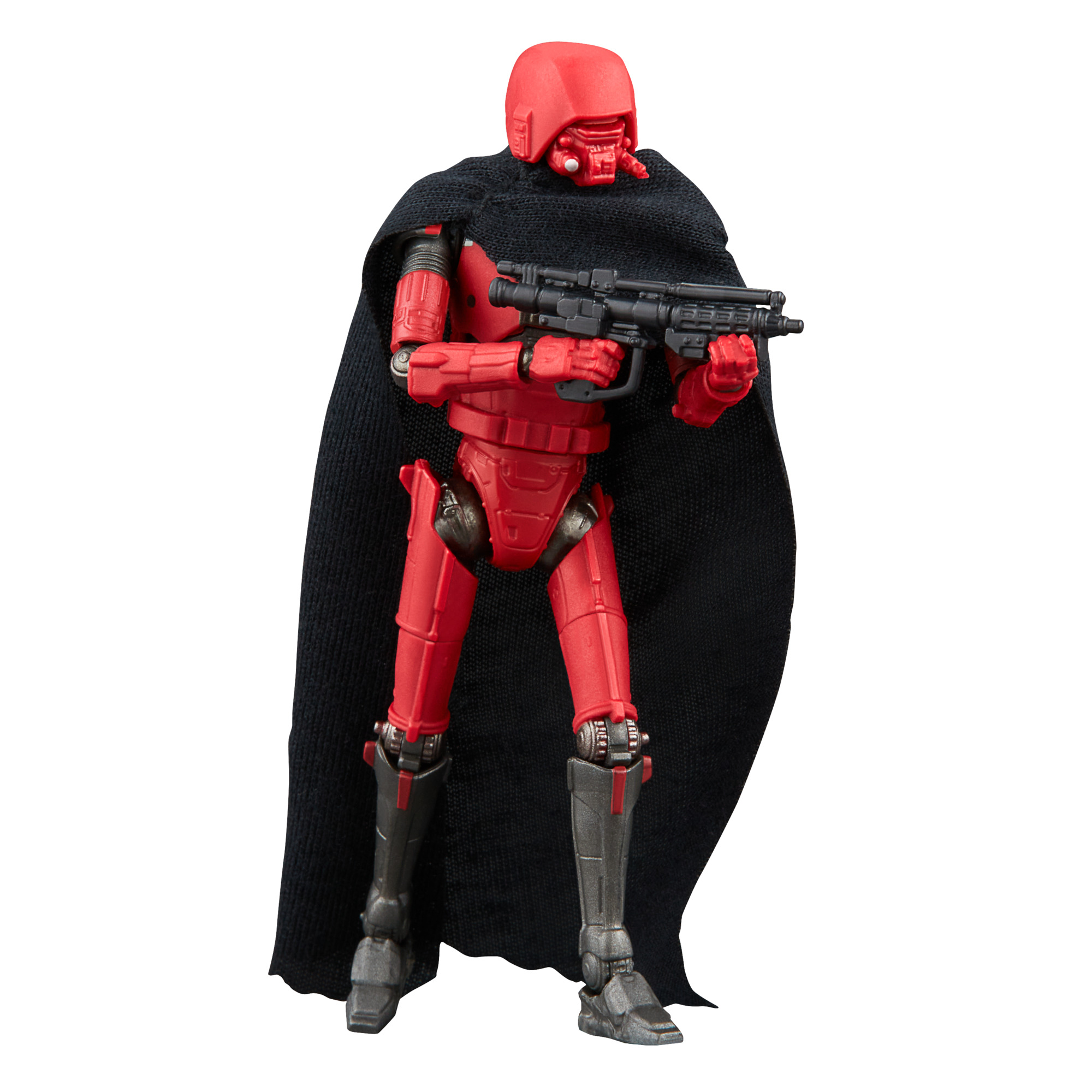 Action figure rossa corazzata con fucile, con mantello nero, isolata su bianco.
