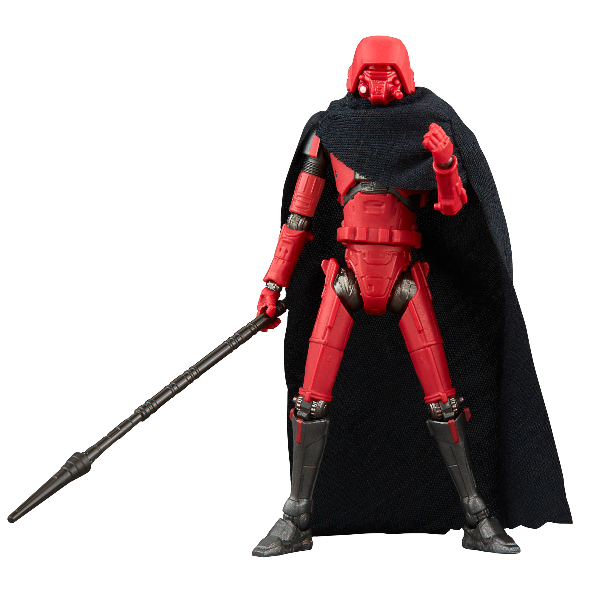 Action figure in tuta rossa con un bastone e un mantello scuro. Sfondo bianco.