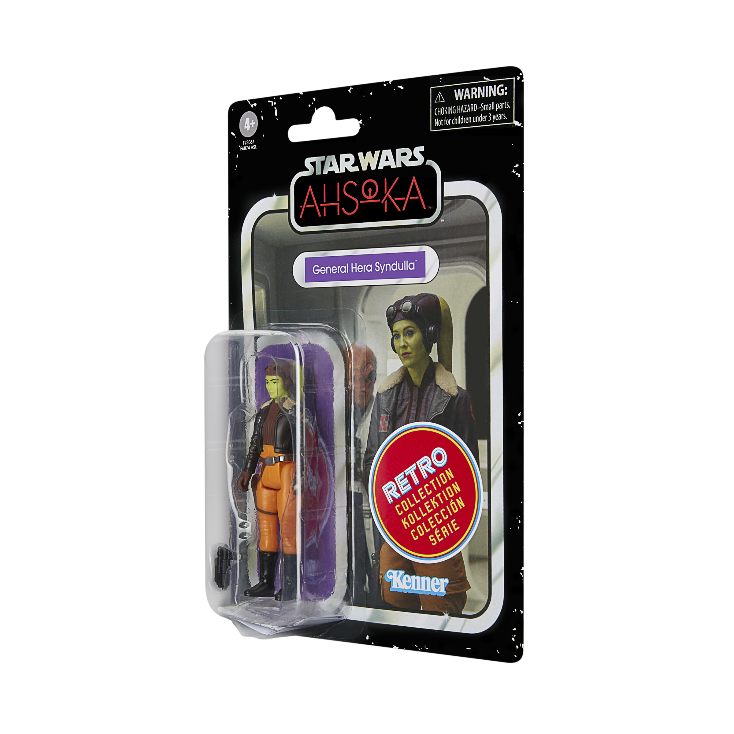 Un paquete de juguetes de Star Wars con una figura alienígena verde dentro. La figura está en una funda de plástico transparente.