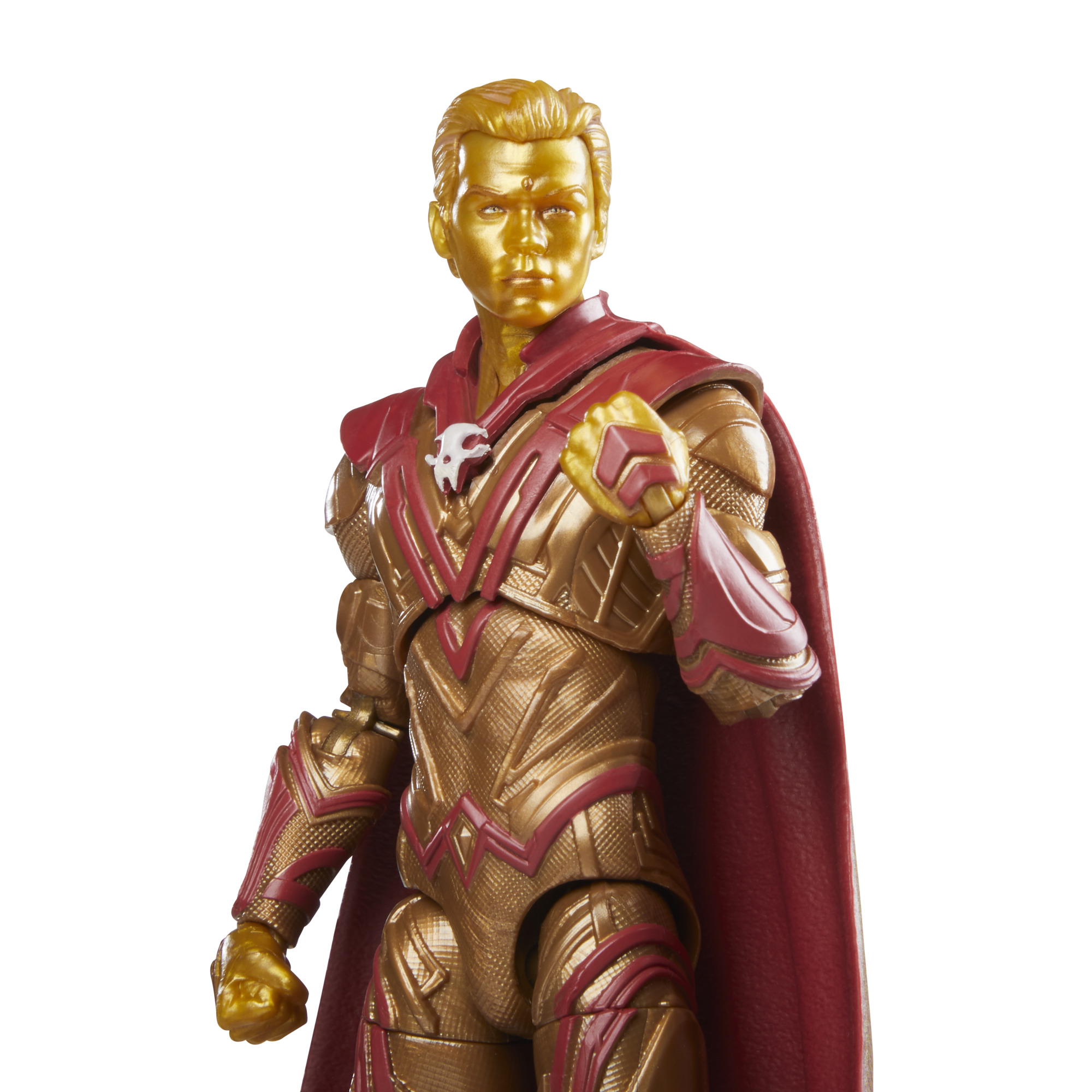 Figura de acción dorada de un hombre con capa roja. Viste traje dorado, con calavera blanca.