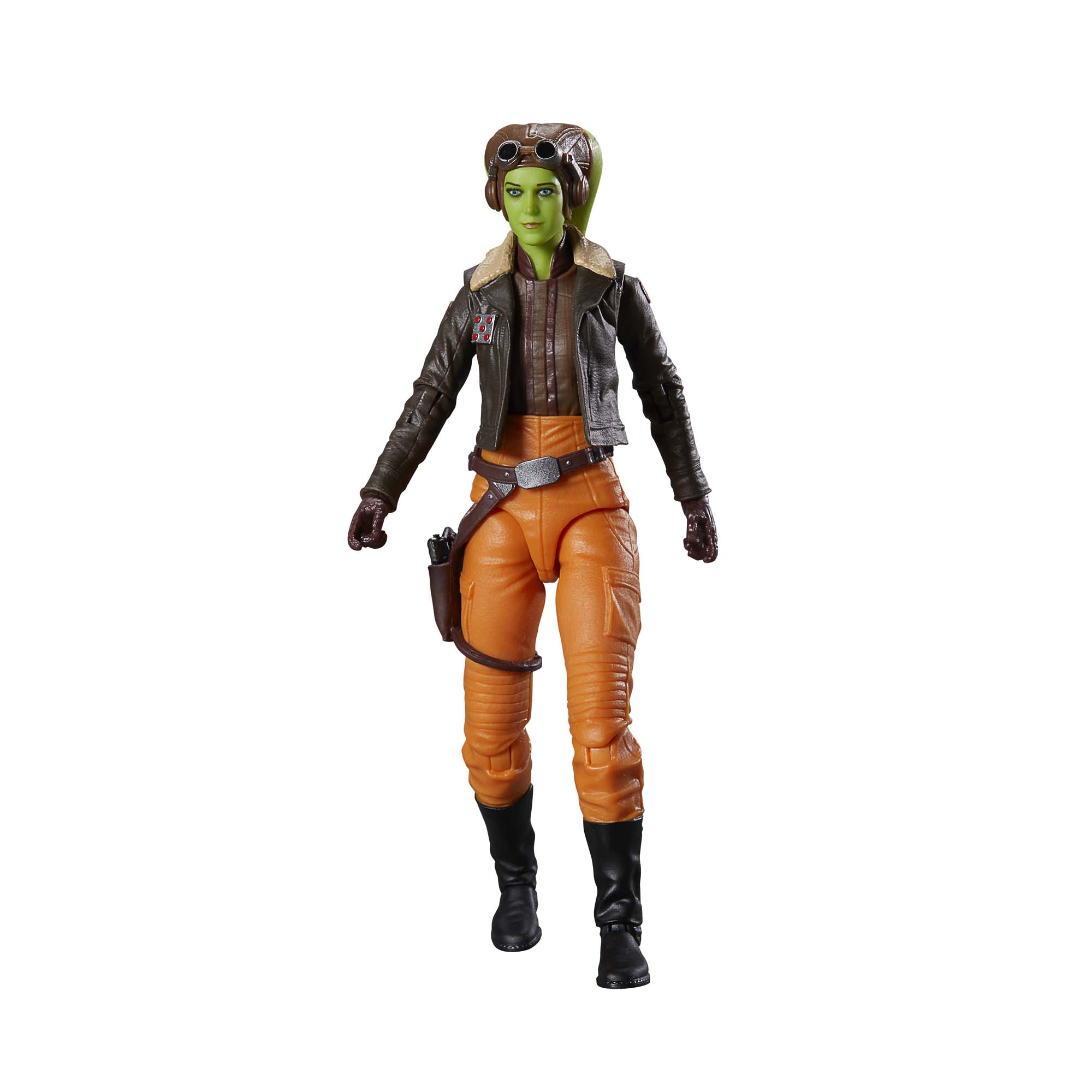 Figura alienígena verde, con chaqueta marrón, pantalones naranjas y botas negras.