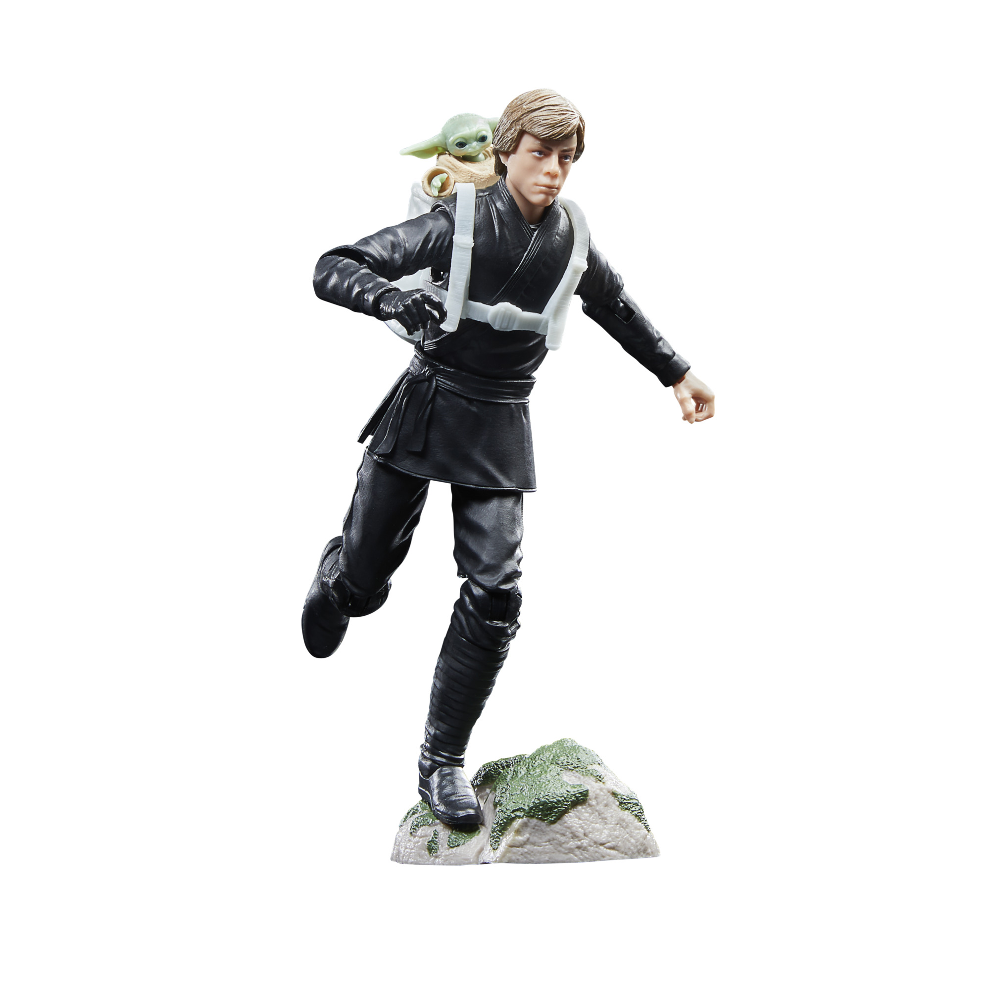 Figura de acción de Luke Skywalker corriendo con Grogu en la espalda, una figura verde, sobre una roca.