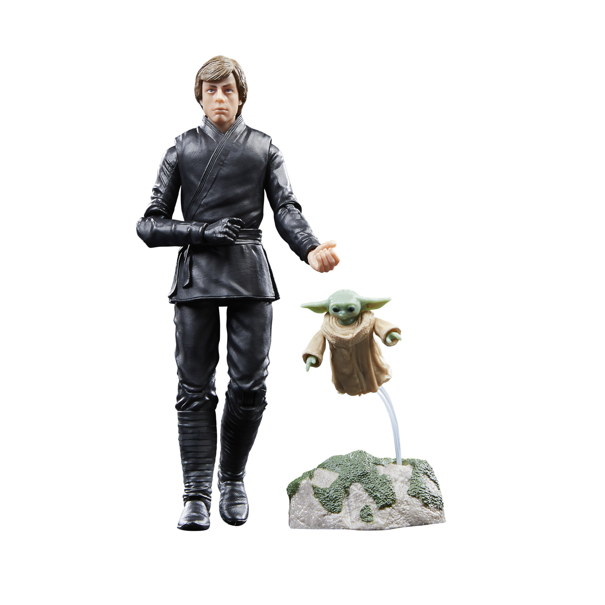 Figuras de acción de Luke Skywalker y Grogu. Luke en negro, Grogu flotando, con base de piedra, fondo blanco.