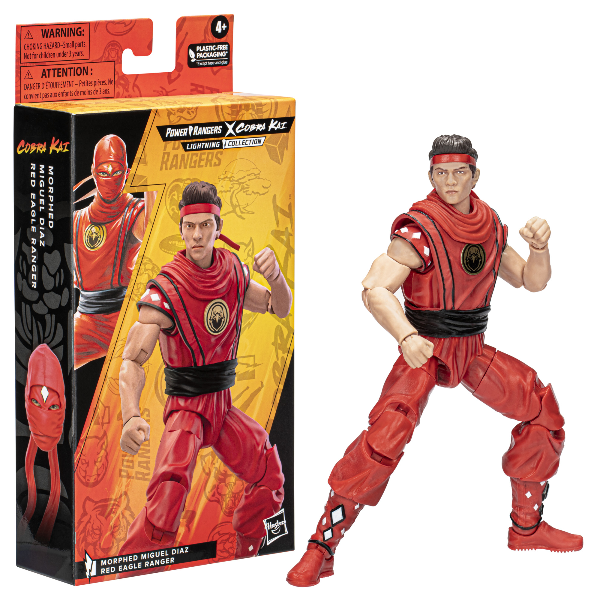 Figura de acción roja de Cobra Kai en pose de lucha, junto a su caja. La caja presenta una imagen similar.