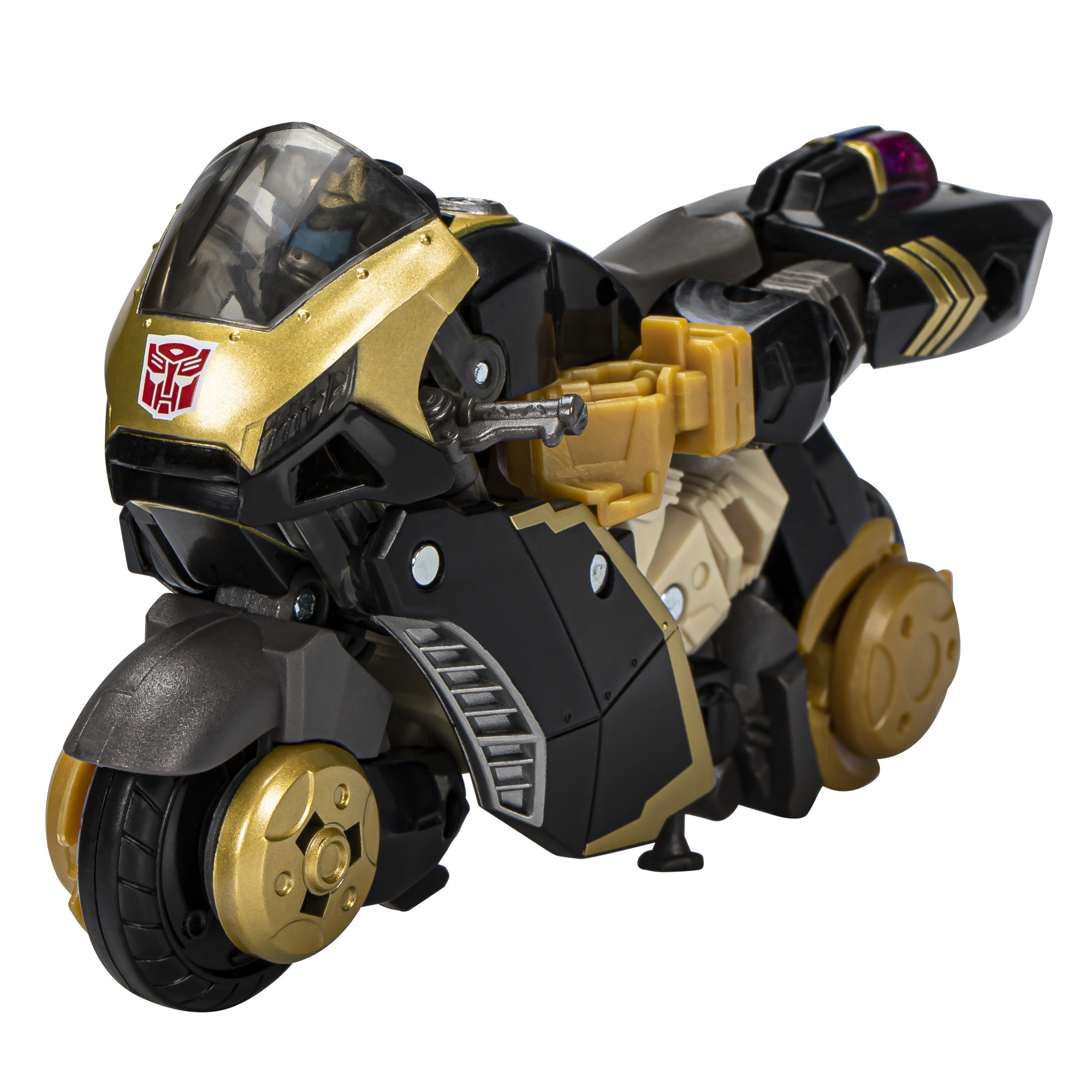 Juguete de motocicleta Transformer en negro y dorado, mostrando detalles del vehículo.