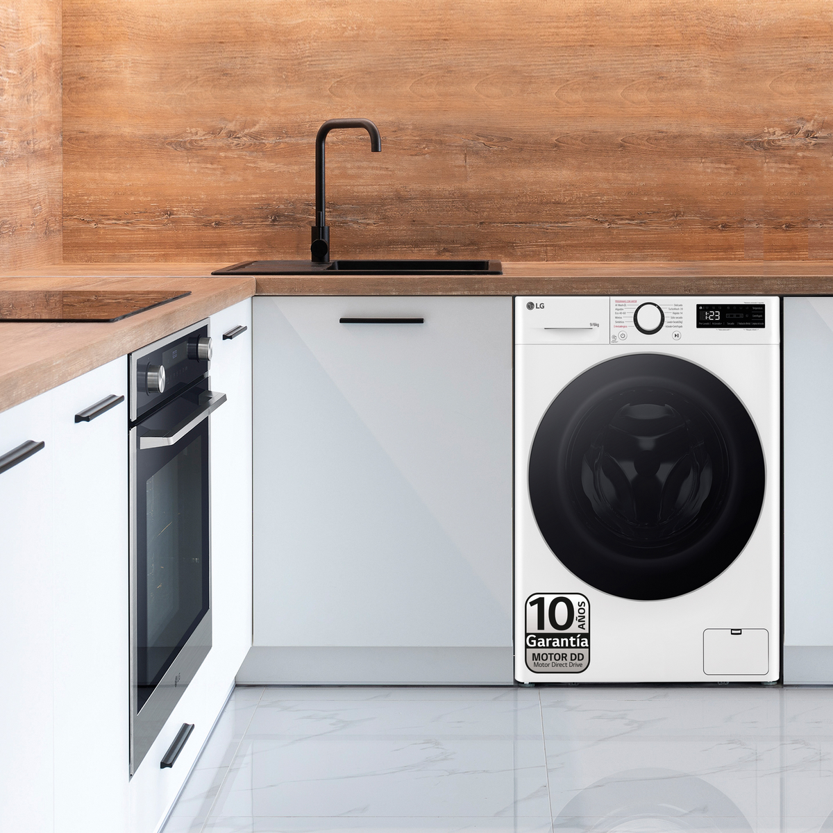 Biała pralka. Jest wbudowana w blat kuchenny z czarną baterią i kuchenką.