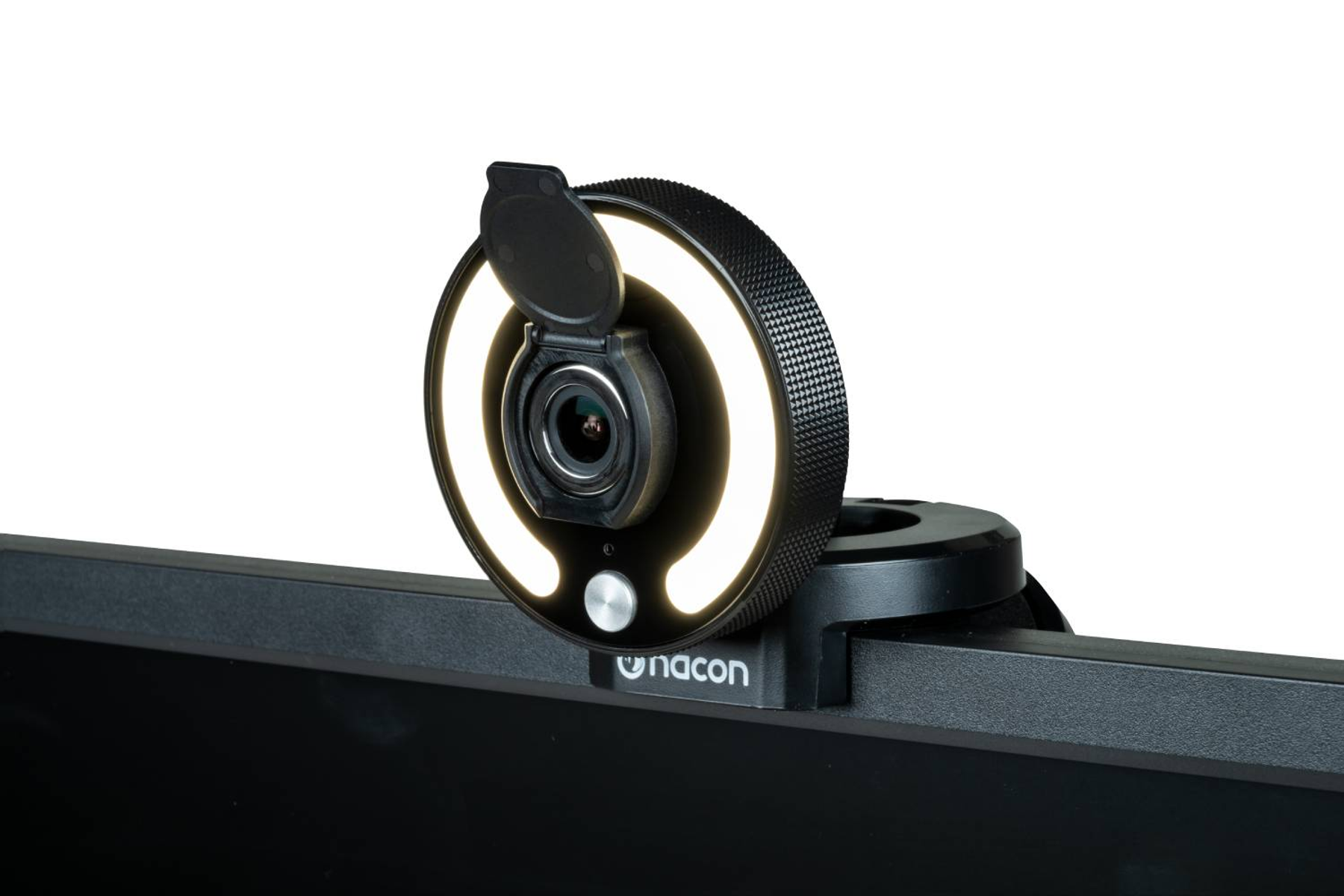 Webcam montata su un monitor. Presenta un anello luminoso e una lente ed è di colore nero.