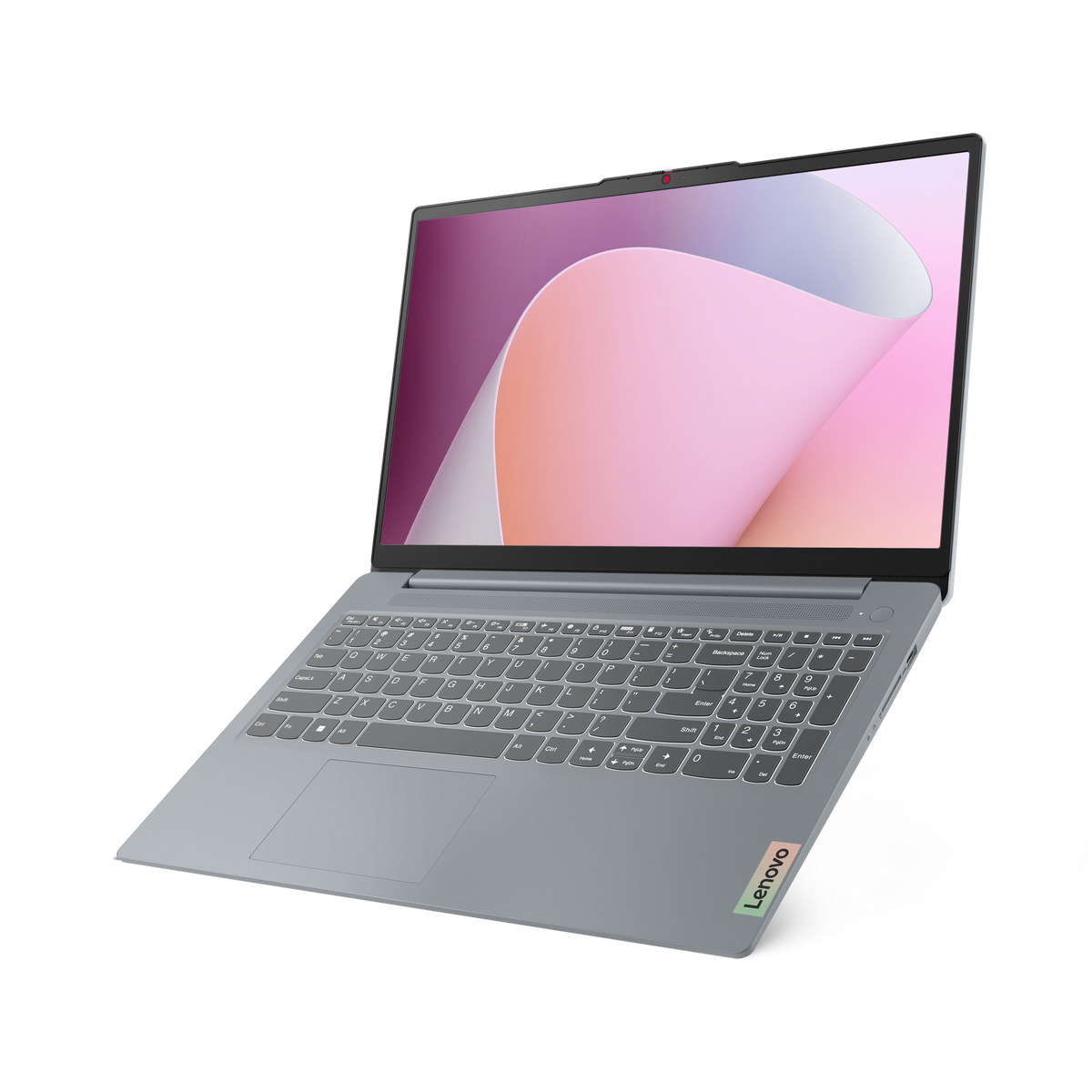 Portátil gris con pantalla abierta. La pantalla muestra formas rosas y moradas. Logotipo de Lenovo visible.