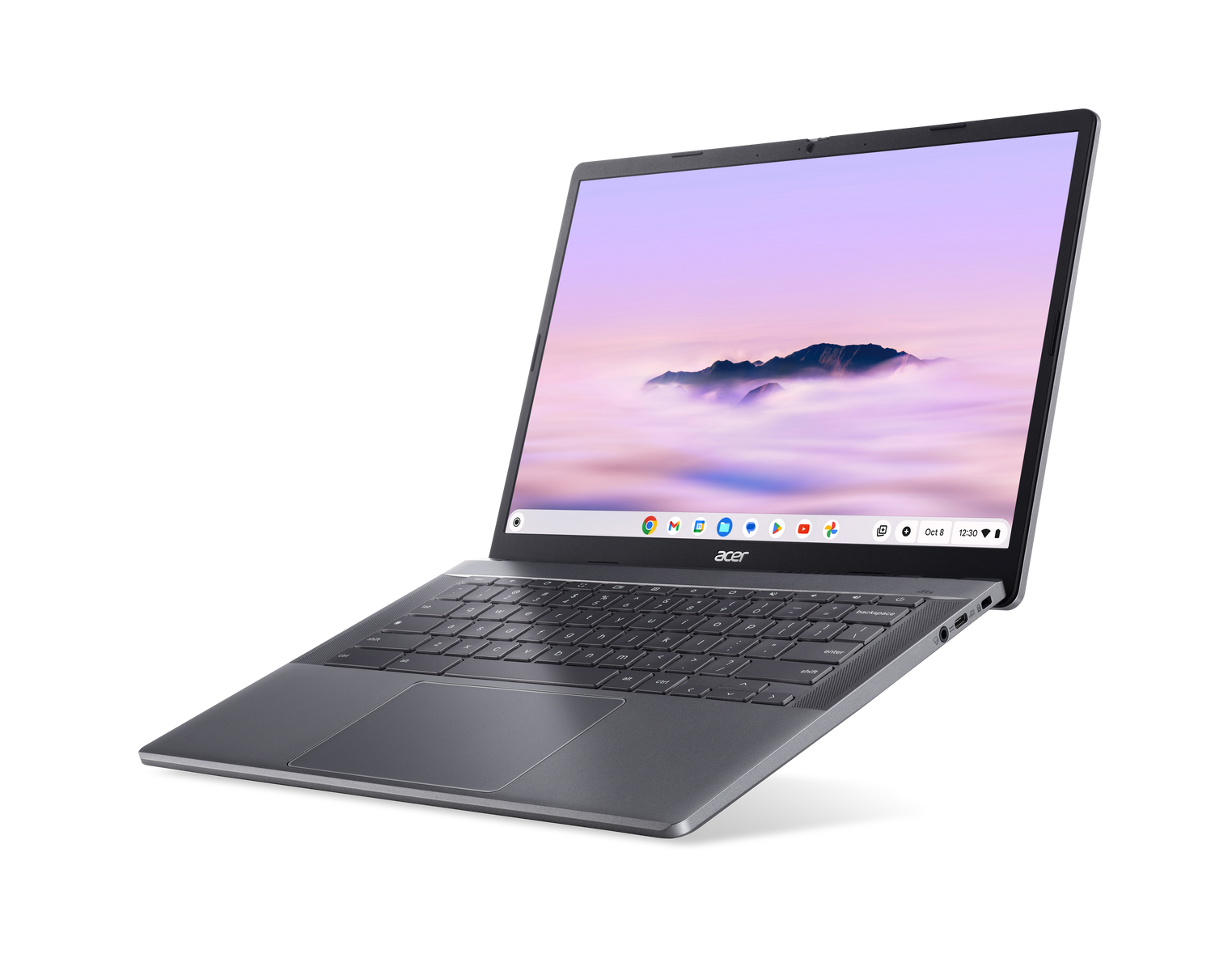 Chromebook Acer plateado. La pantalla muestra una interfaz colorida. El portátil está abierto.