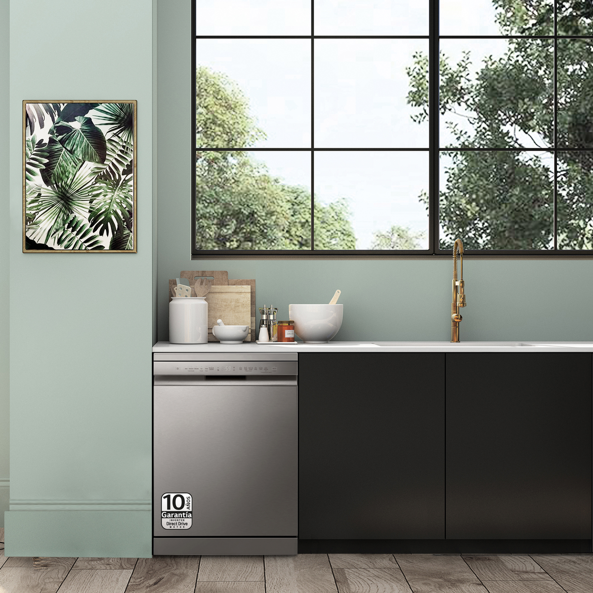 Una cocina moderna con lavavajillas instalado bajo encimera, cerca de una ventana y obras de arte.