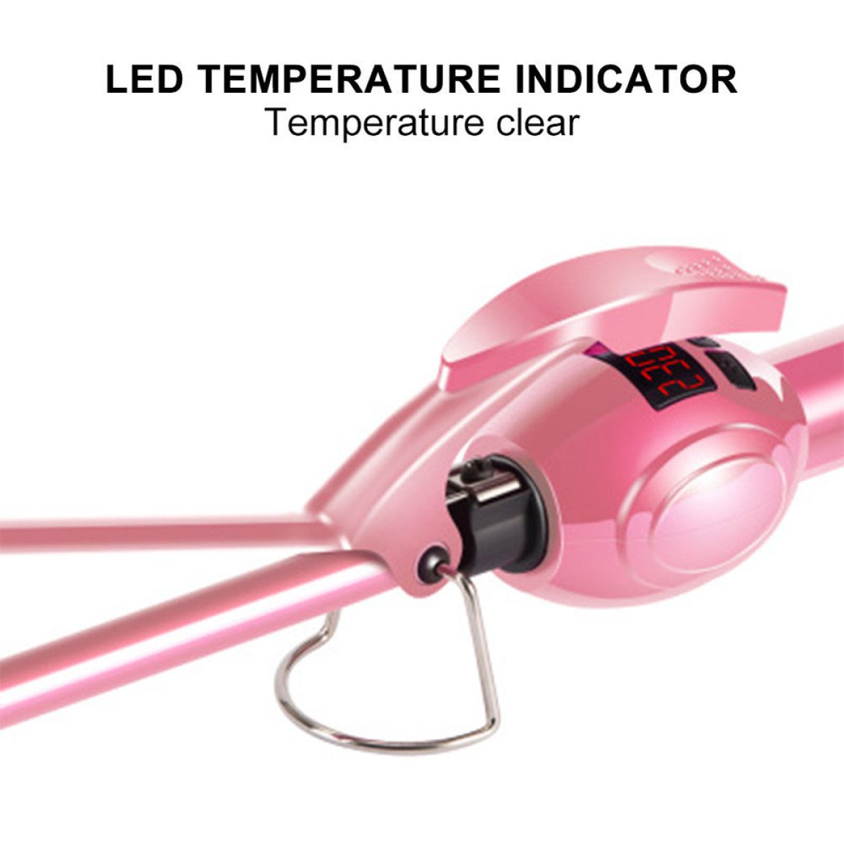 Nahaufnahme eines pinkfarbenen Lockenstabs. Er hat eine Digitalanzeige, die die Temperatur anzeigt.