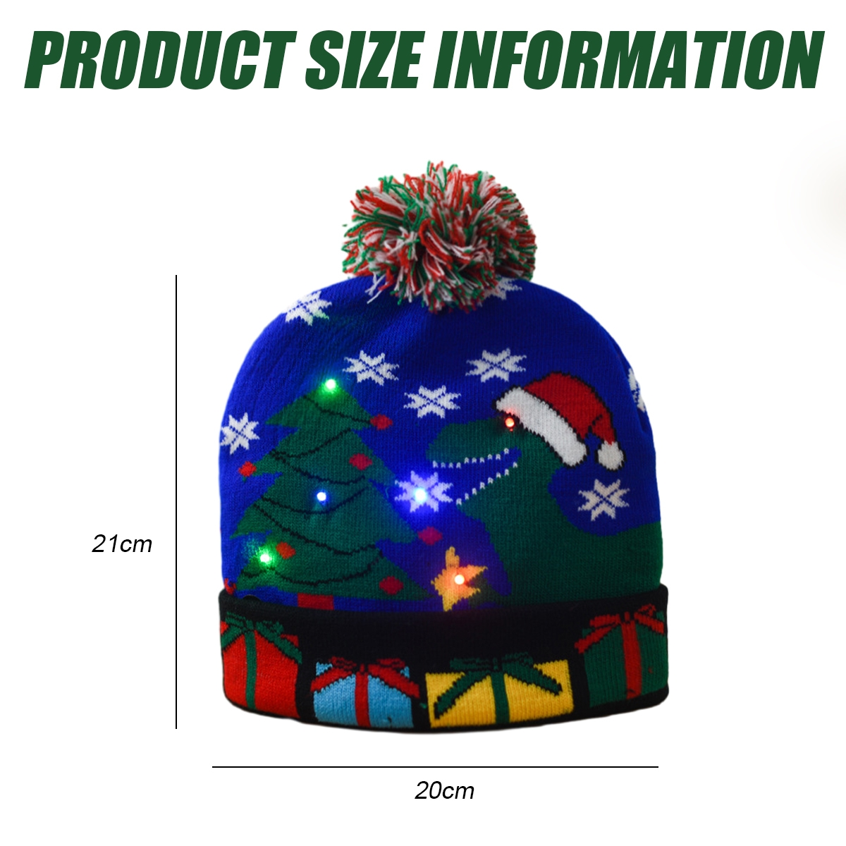Weihnachtsmütze mit Dinosaurier, Baum, Geschenken und Lichtern. Blaue Mütze mit grünem Dinosaurier und rotem Bommel.