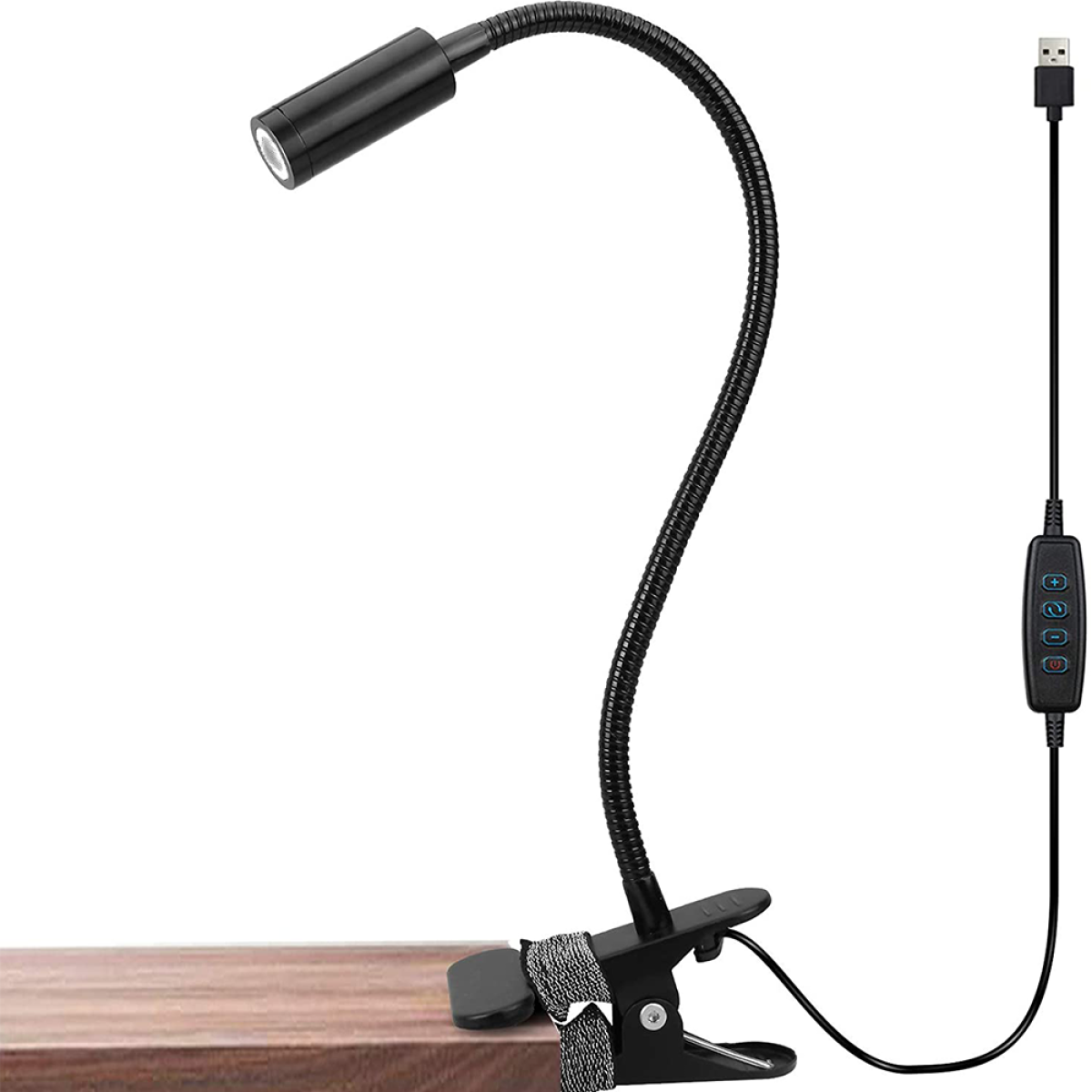 Eine schwarze, flexible Schwanenhalslampe mit Clip-on-Sockel und USB-Kabel auf Holzoberfläche.