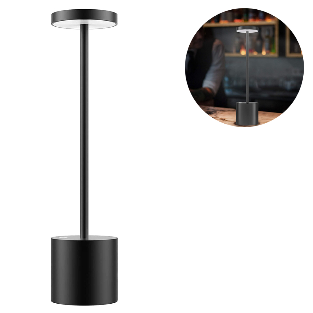 Eine schwarze zylindrische Lampe mit einem kreisförmigen Licht an der Oberseite, auf weißem Hintergrund und einem Barhintergrund.